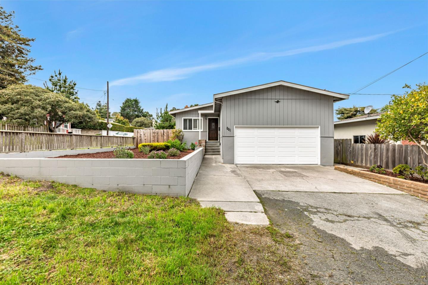 801 Lobos Street Monterey, CA 93940 - Photo 35 of 43 a front view of a house with a yard