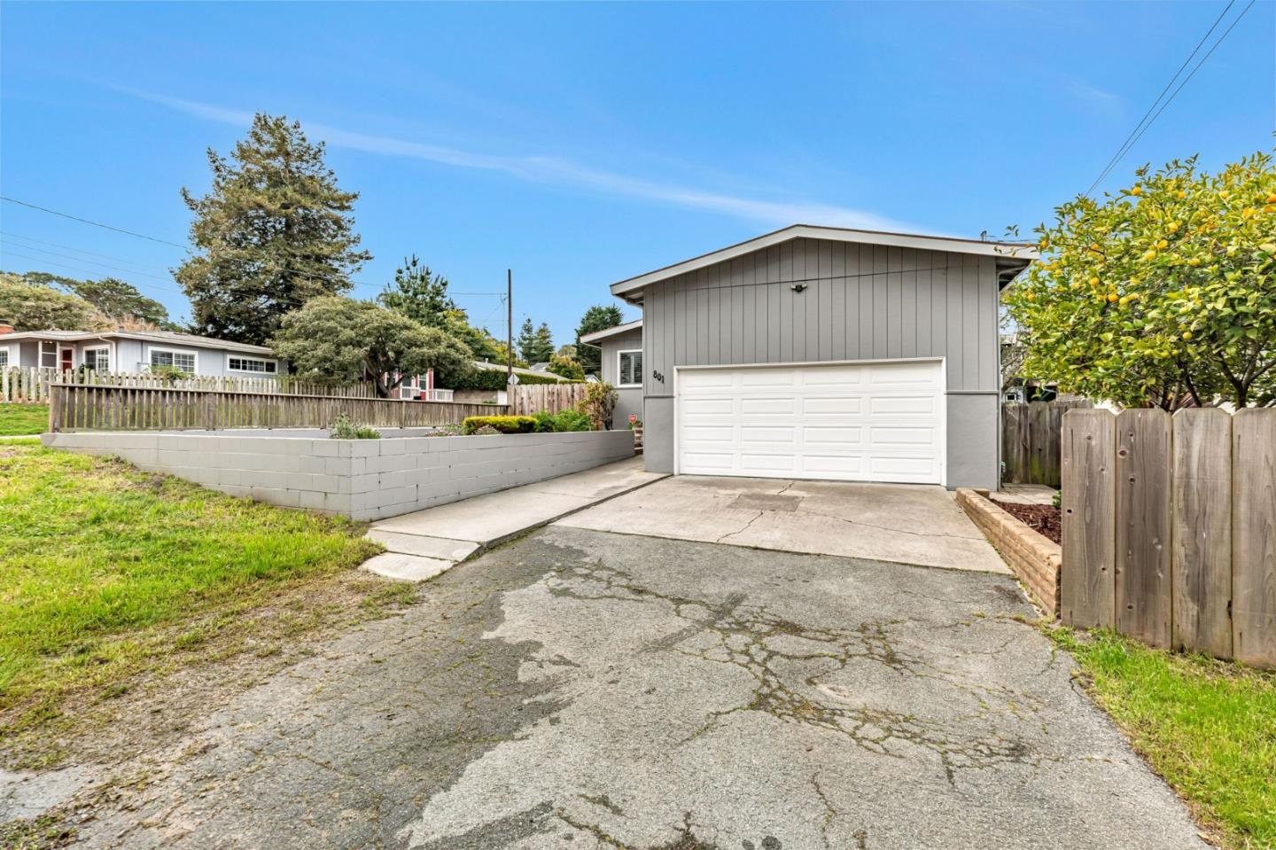 801 Lobos Street Monterey, CA 93940 - Photo 36 of 43 a view of a house with a yard