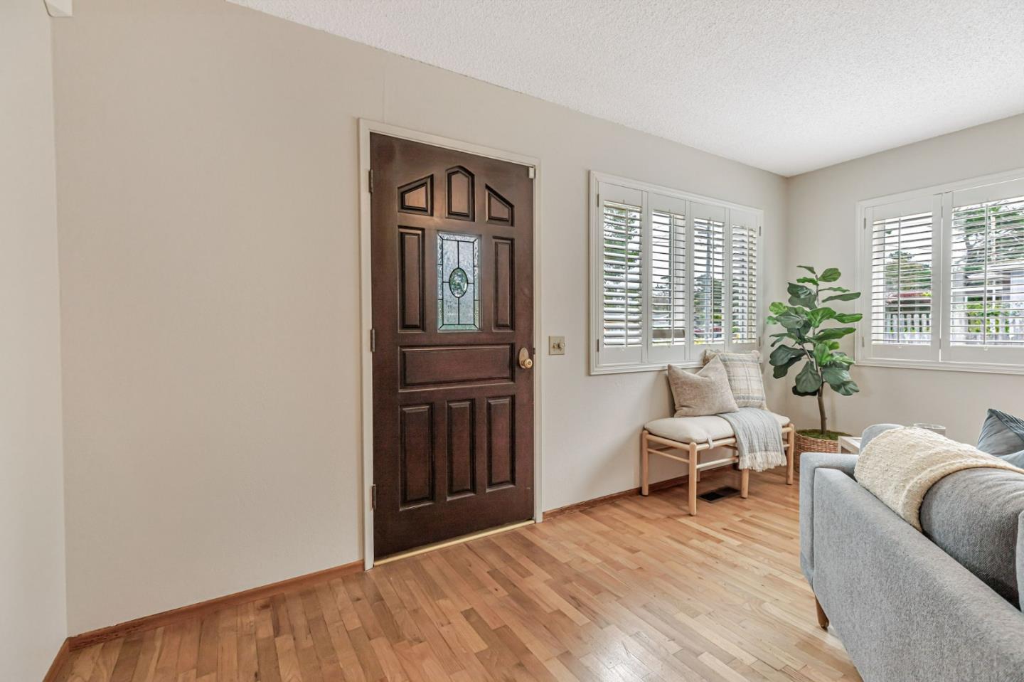 801 Lobos Street Monterey, CA 93940 - Photo 5 of 43 a living room with furniture and a window