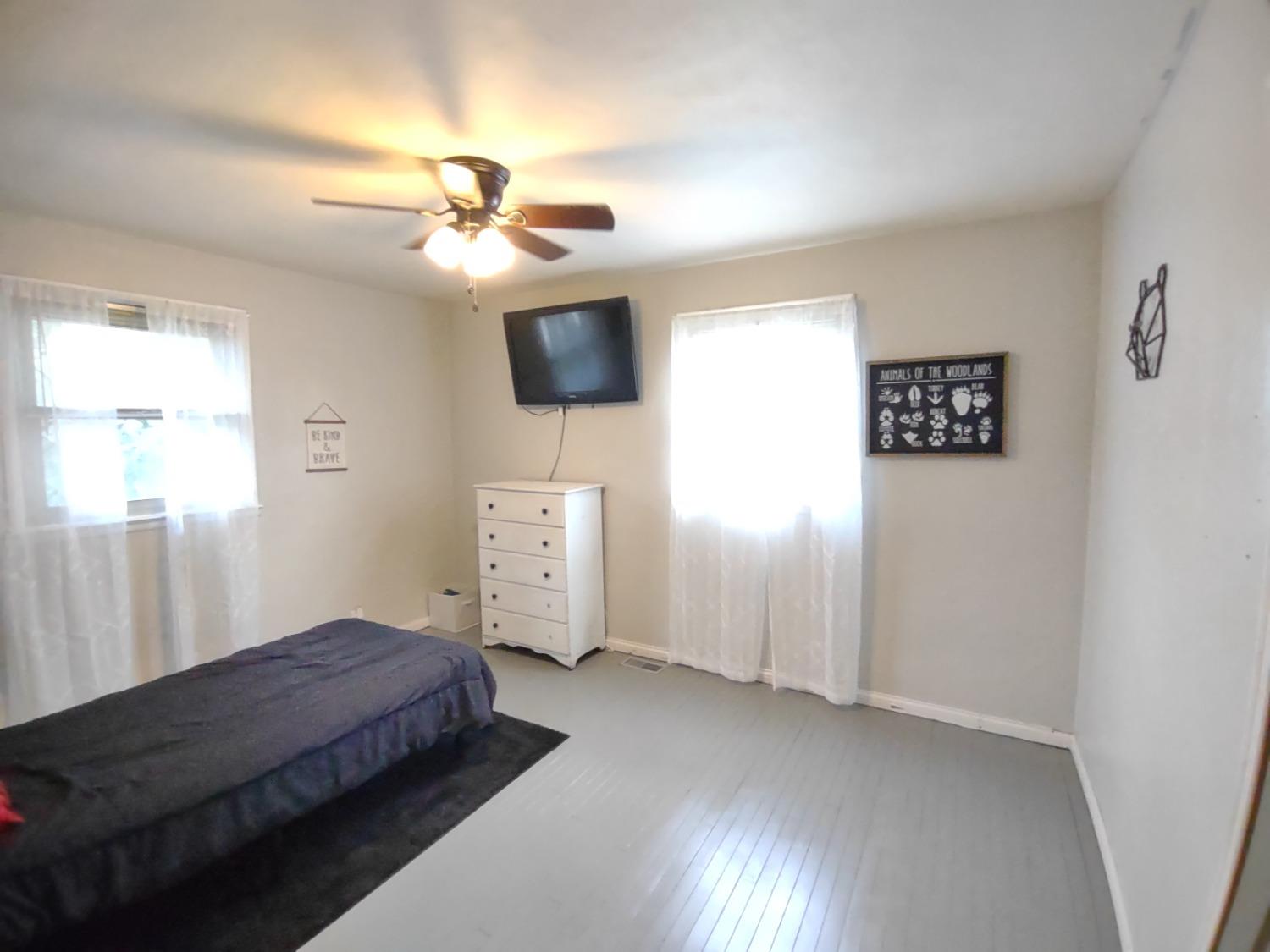 369 Tower Road Lawrenceburg, IN 47025 - Photo 15 of 22 bedroom 1 with hardwood floors & ceiling fan