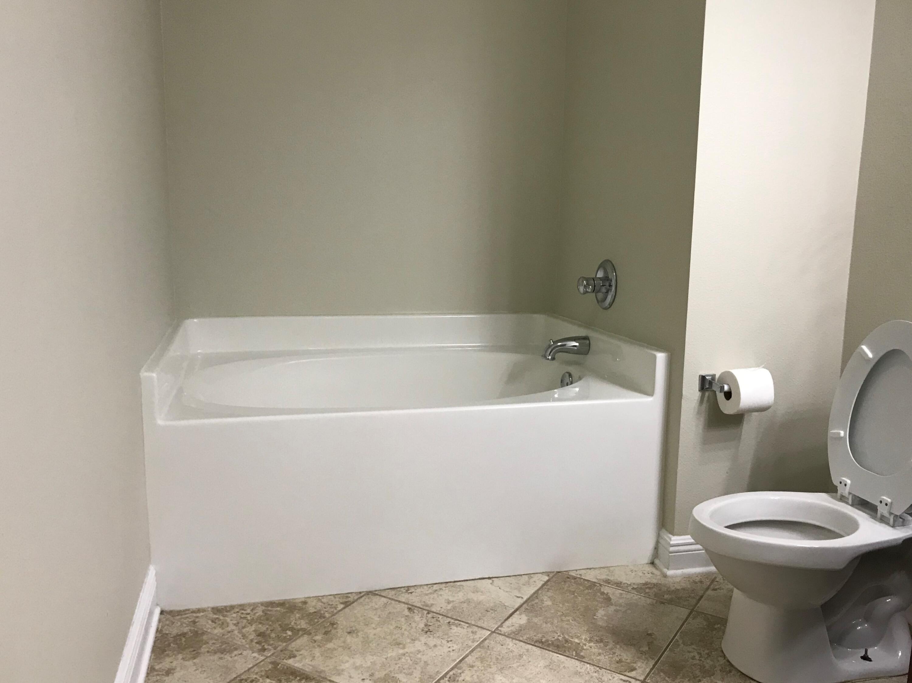 749 Lime Lane Crestview, FL 32536 - Photo 9 of 14 a bathroom with a sink and a toilet
