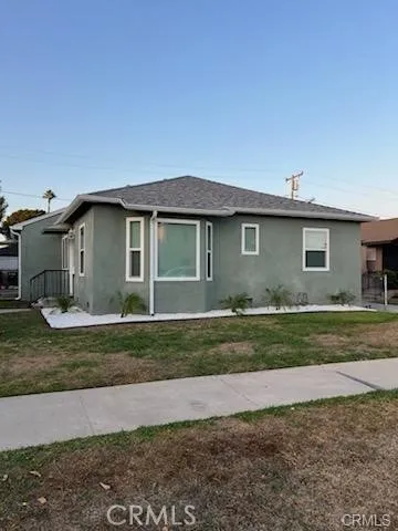 a house view with a garden space