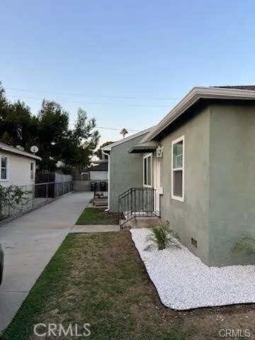 a view of a backyard of the house