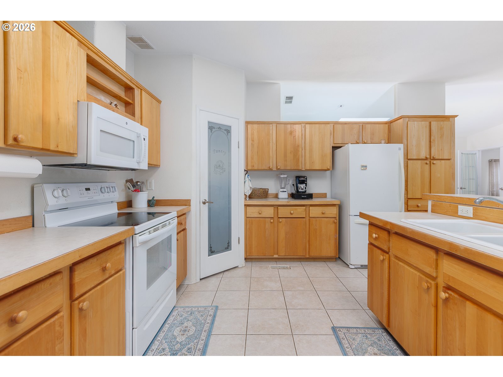 2018 Northwest Oceanic Loop Waldport, OR 97394 - Photo 12 of 35 a kitchen with a cabinets and appliances