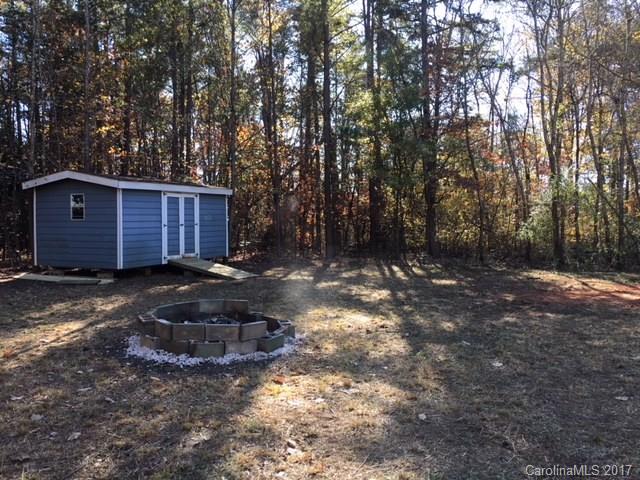 145 Loray Farm Road, Unit L2 Dallas, NC 28034 - Photo 3 of 9 a view of a back yard of the house