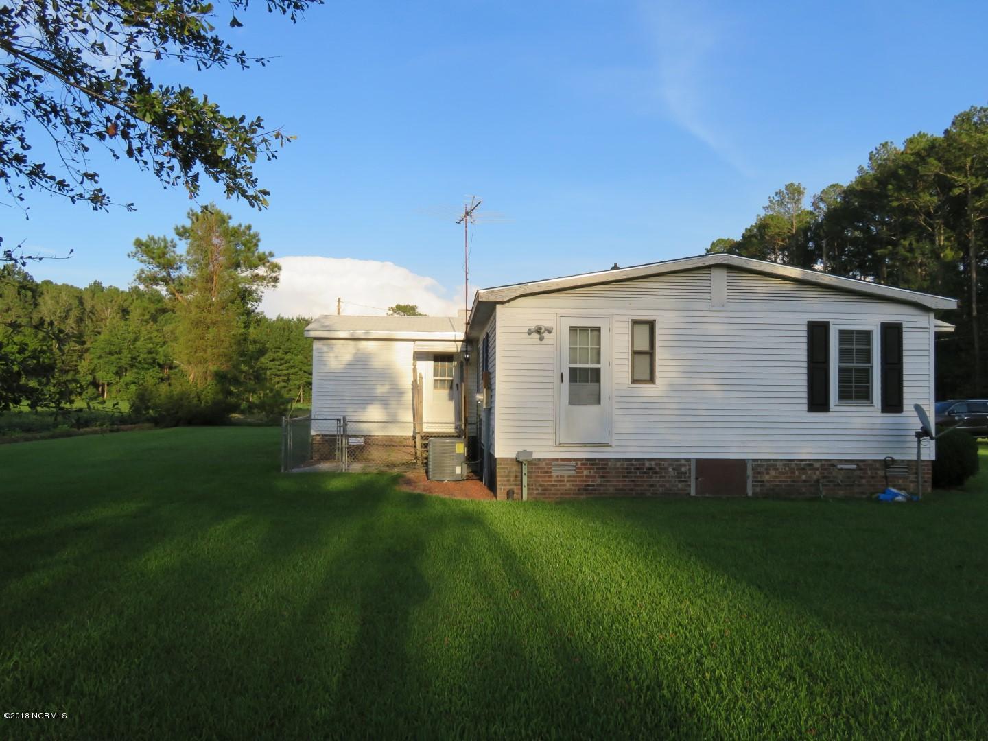 2775 Hills Neck Road Ernul, NC 28527 - Photo 18 of 29 Side View