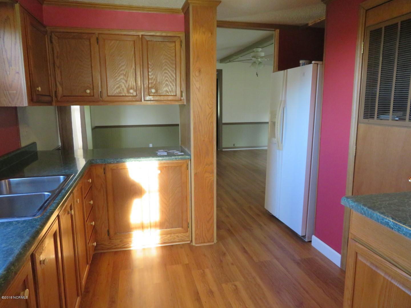 2775 Hills Neck Road Ernul, NC 28527 - Photo 5 of 29 Galley Kitchen