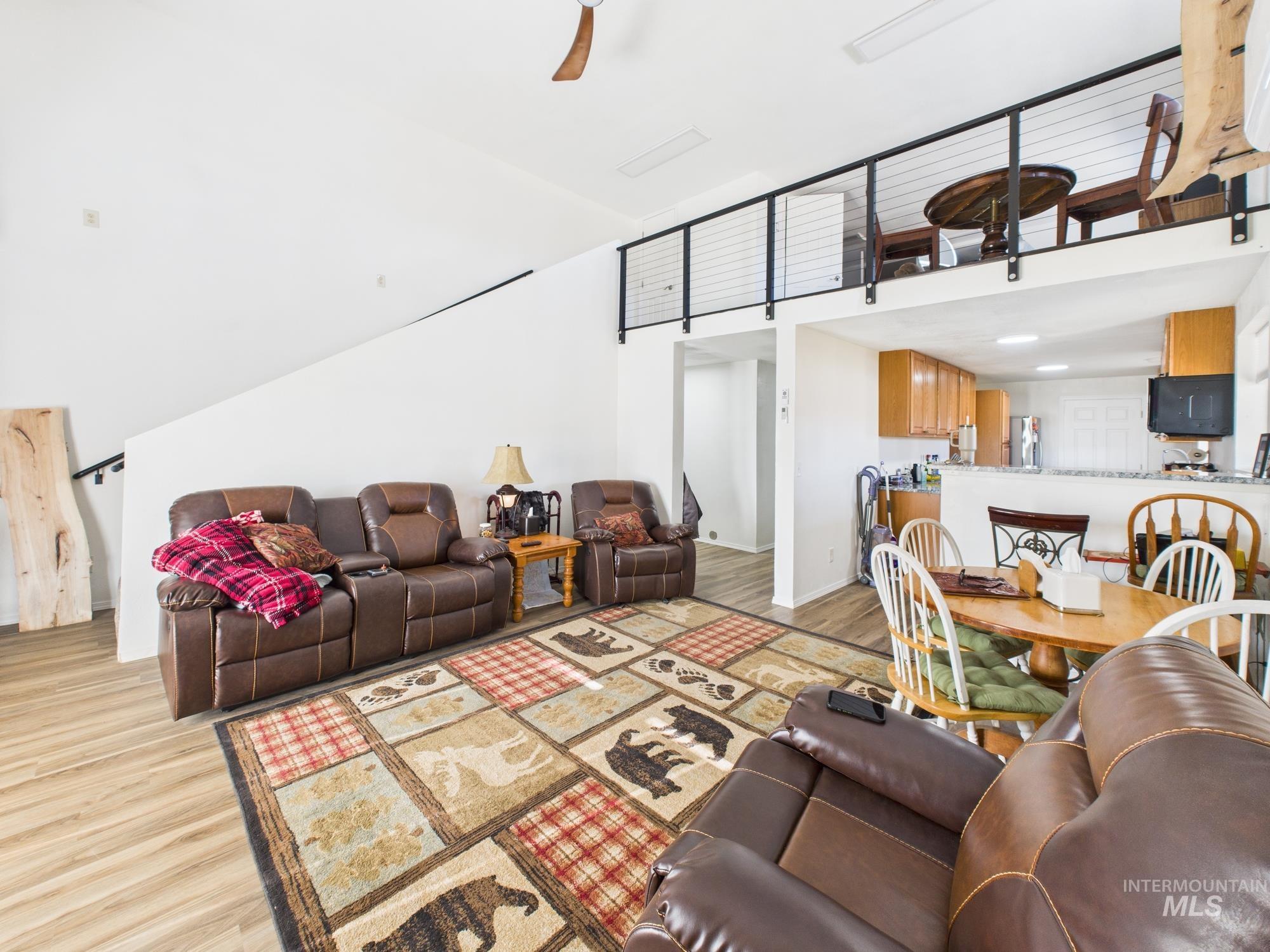1086 Highland Lane Mesa, ID 83643 - Photo 13 of 45 Living area featuring light wood-style flooring, a ceiling fan, and recessed lighting
