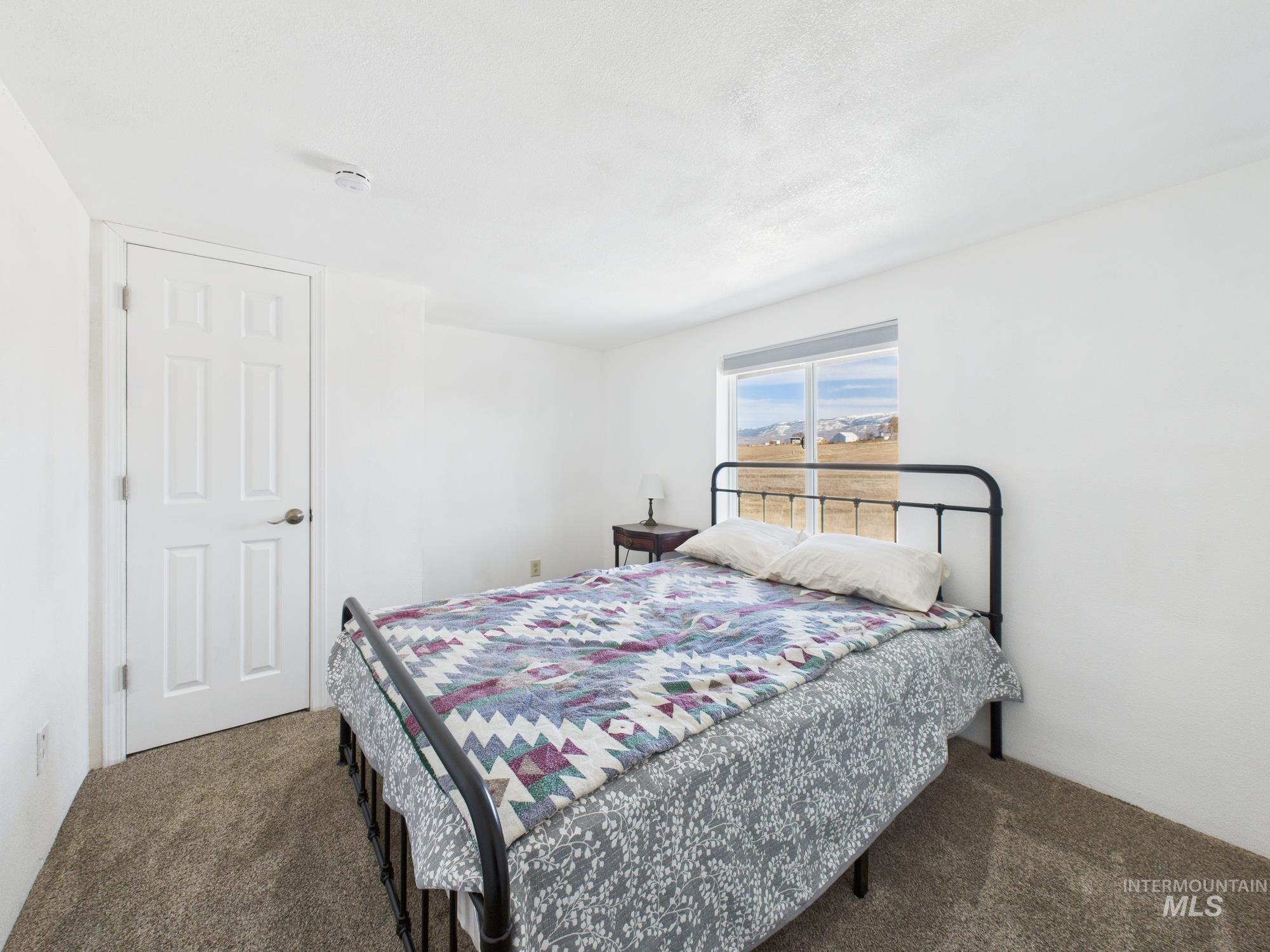 1086 Highland Lane Mesa, ID 83643 - Photo 23 of 45 Bedroom with carpet flooring
