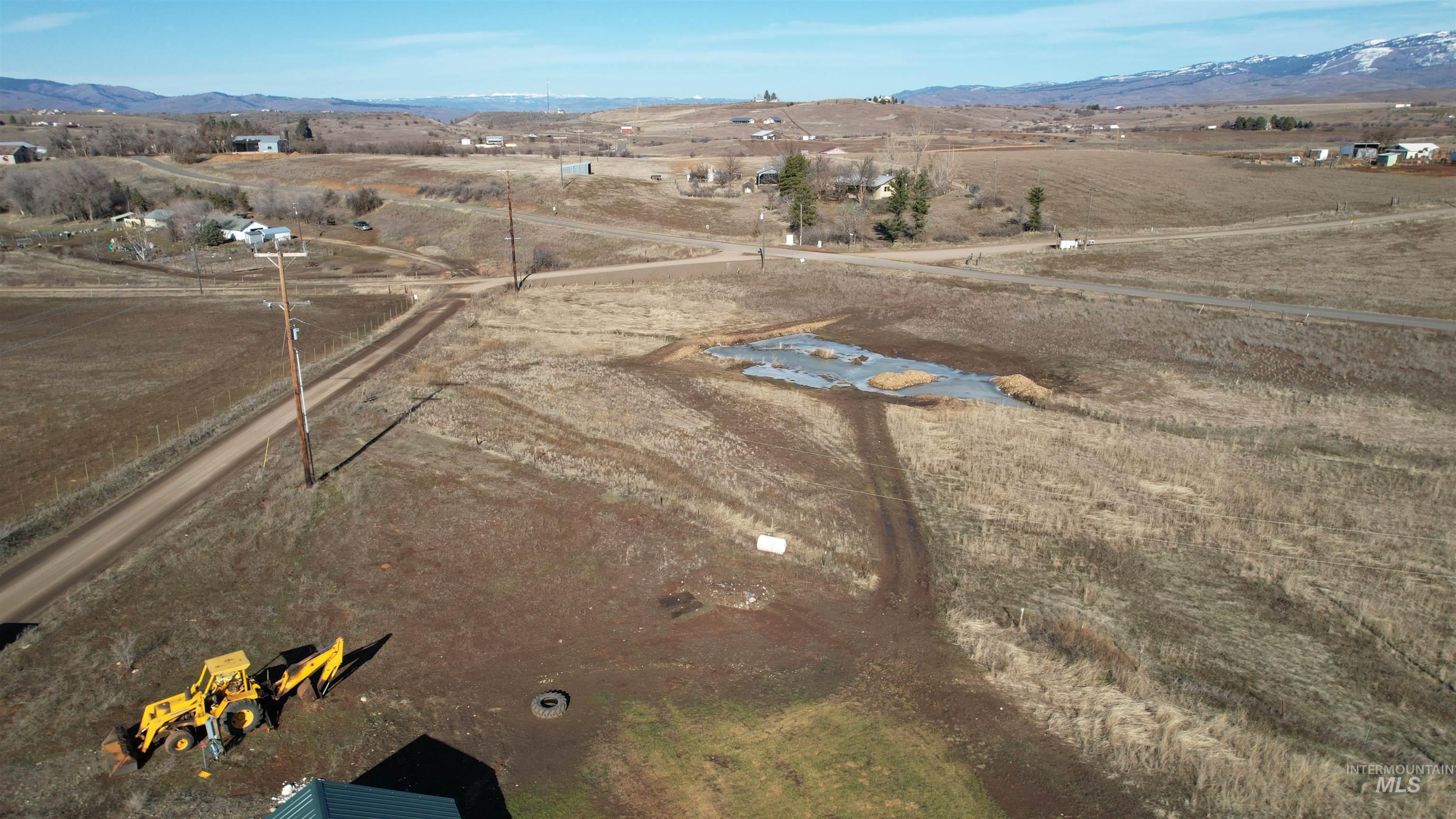 1086 Highland Lane Mesa, ID 83643 - Photo 40 of 45 Aerial view of sparsely populated area with a mountainous background