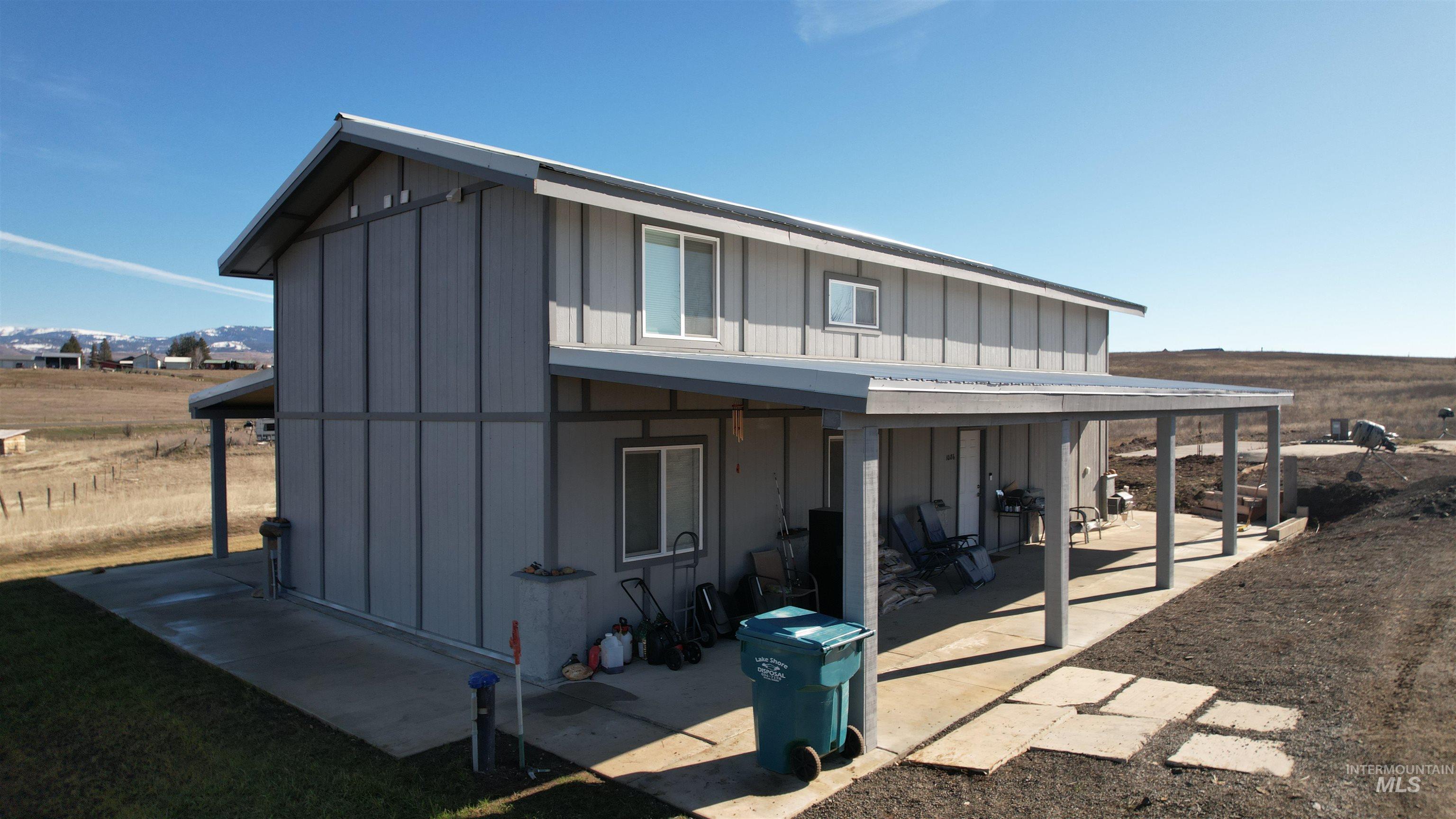 1086 Highland Lane Mesa, ID 83643 - Photo 4 of 45 Rear view of house with board and batten siding