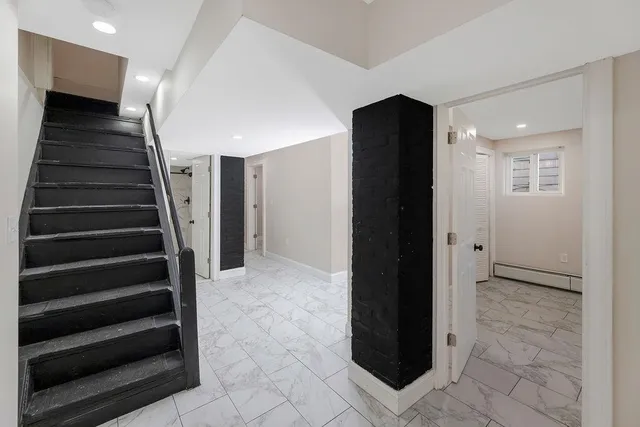 a view of entryway with stairs