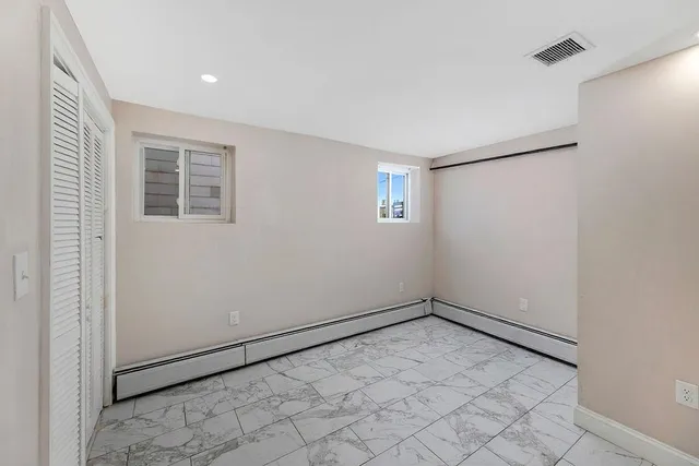 an empty room with windows