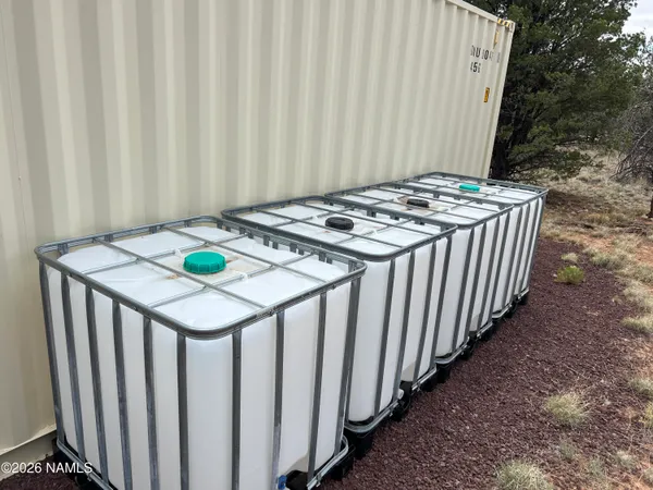 a kitchen that has a stove and a table