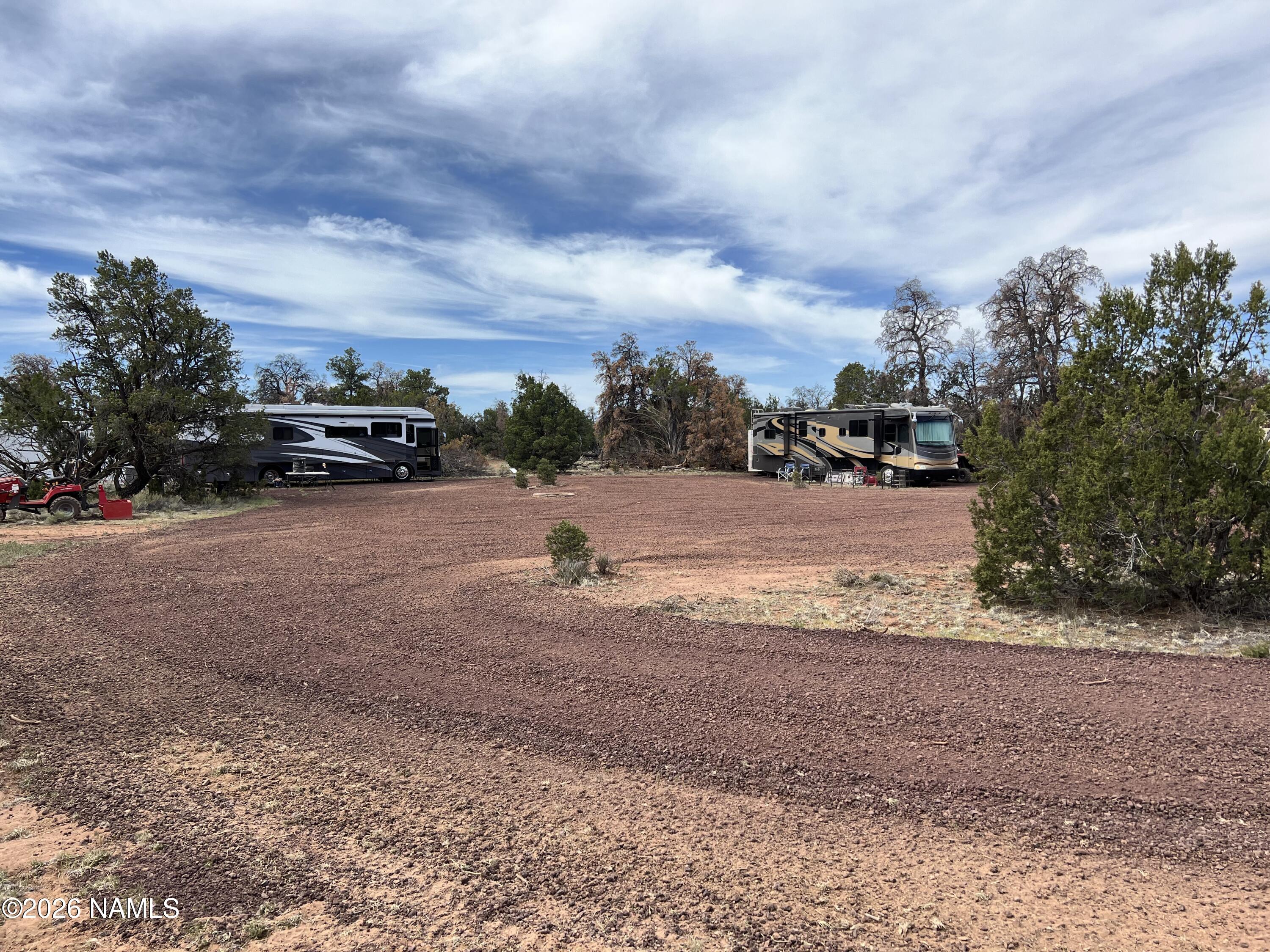 Lot 186 North Bull Run Road Williams, AZ 86046 - Photo 22 of 35 a view of dirt yard with a car parked