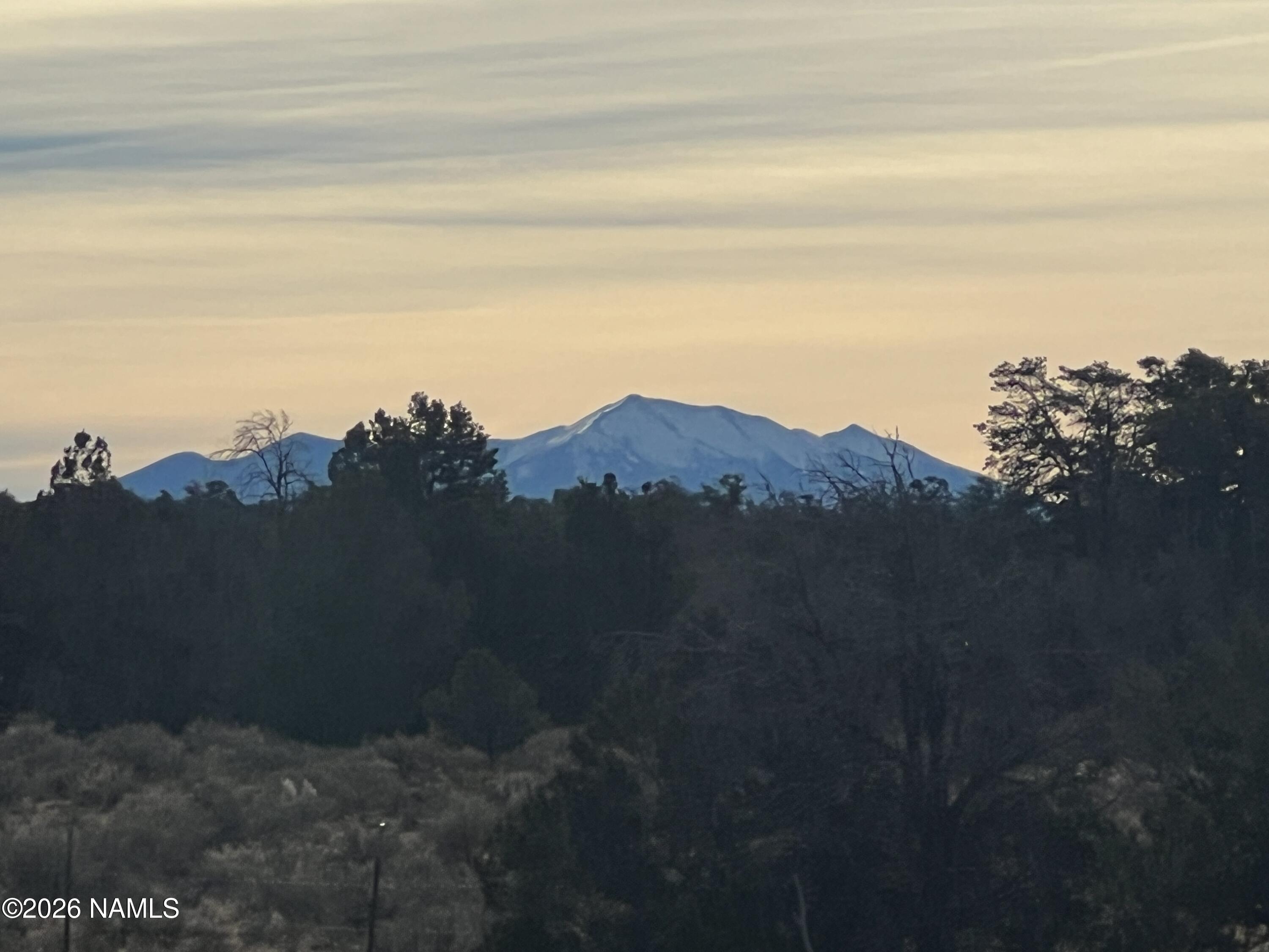 Lot 186 North Bull Run Road Williams, AZ 86046 - Photo 26 of 35 a view of a lake with a mountain in the background