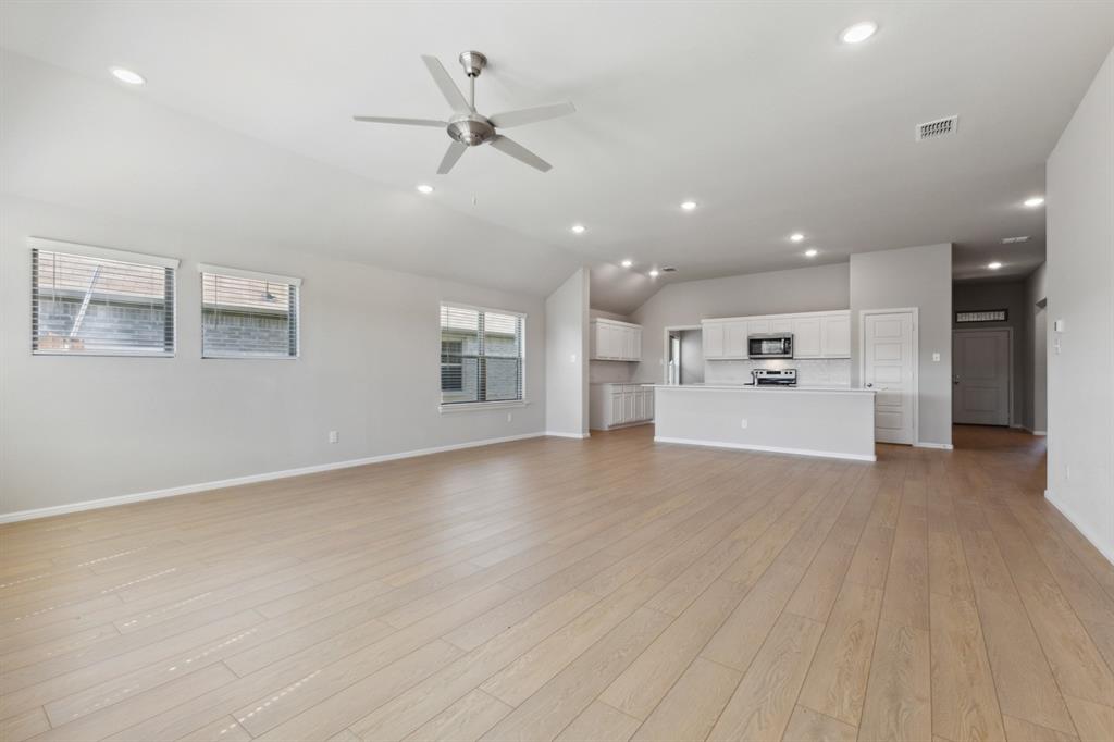 1891 Balfour Bend Forney, TX 75126 - Photo 10 of 23 Living Room in the Diamond home plan by Trophy Signature Homes – REPRESENTATIVE PHOTO