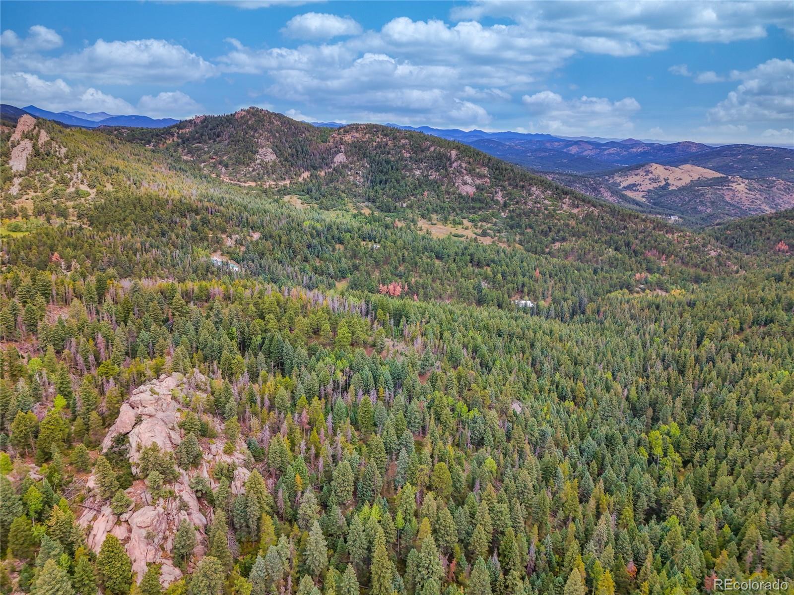 0 Indian Springs Road Morrison, CO 80465 - Photo 27 of 28 a view of a city with mountains in the background
