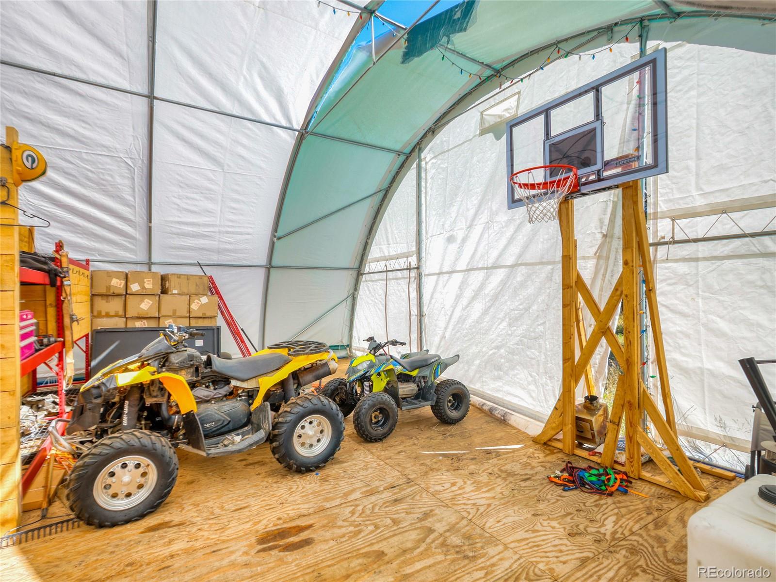 0 Indian Springs Road Morrison, CO 80465 - Photo 7 of 28 a view of a garage with parked cars