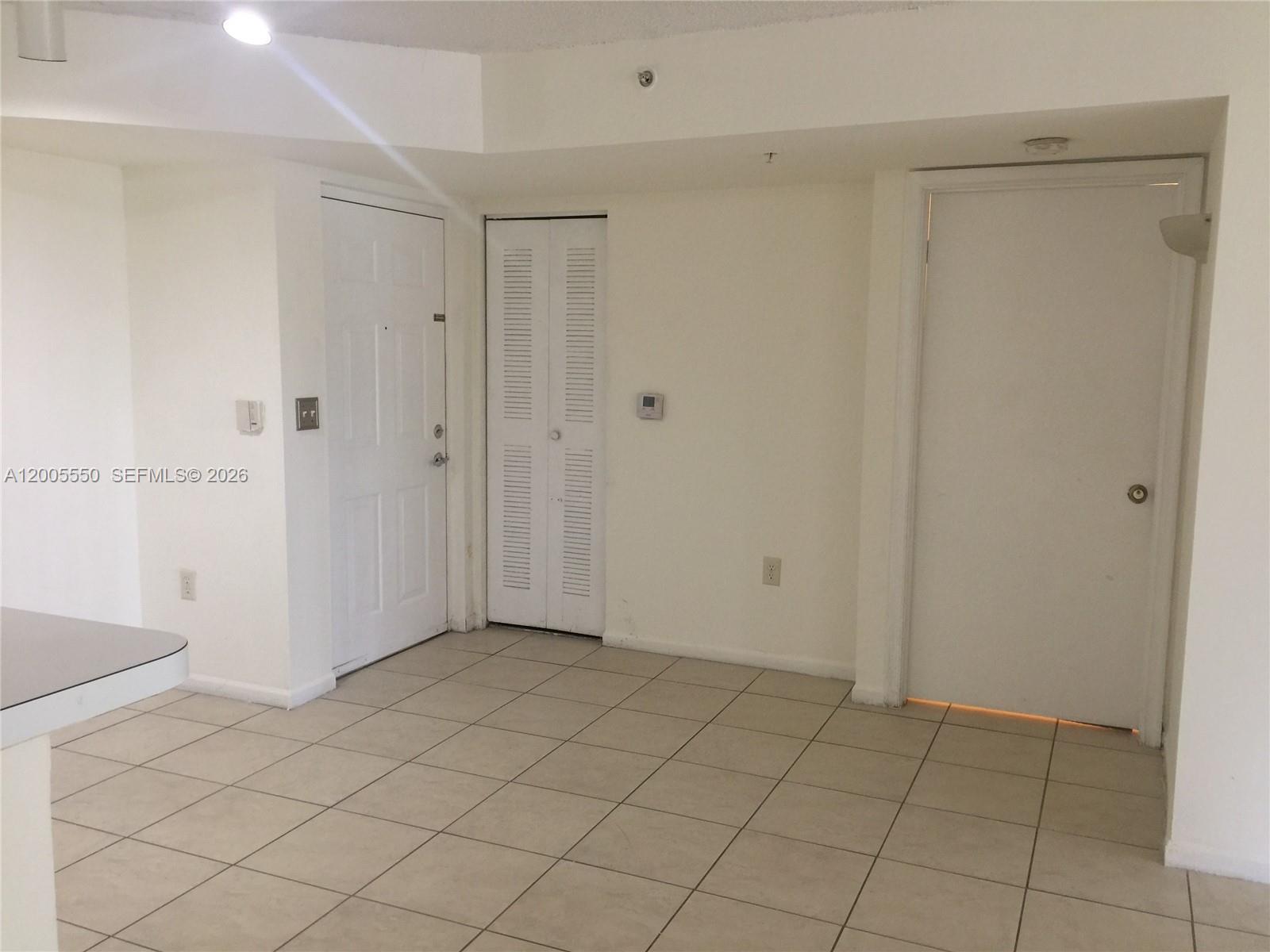2103 Renaissance Boulevard, Unit 104 Miramar, FL 33025 - Photo 3 of 12 a view of an empty room