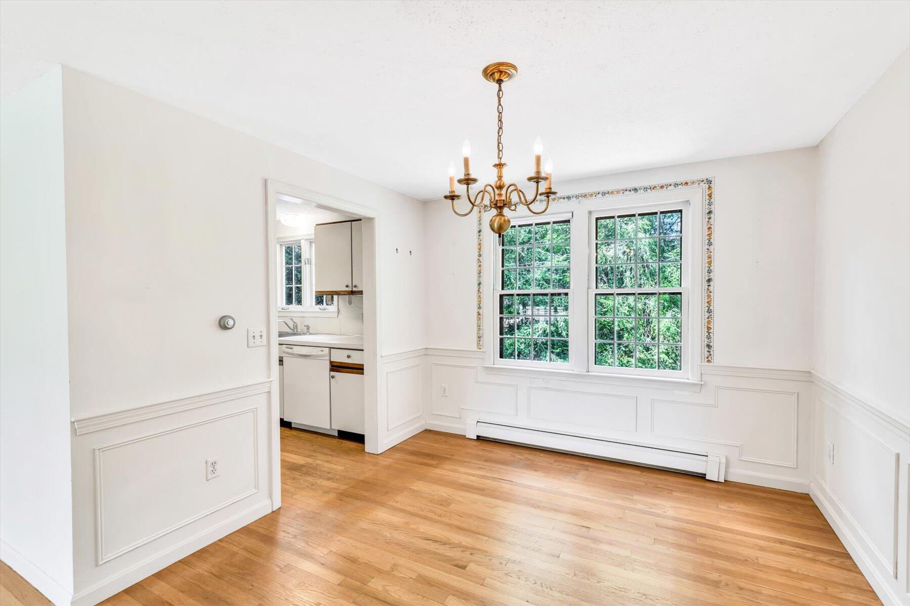 97 Headwaters Road Centerville, MA 02632 - Photo 16 of 44 a view of empty room with a window and chandelier