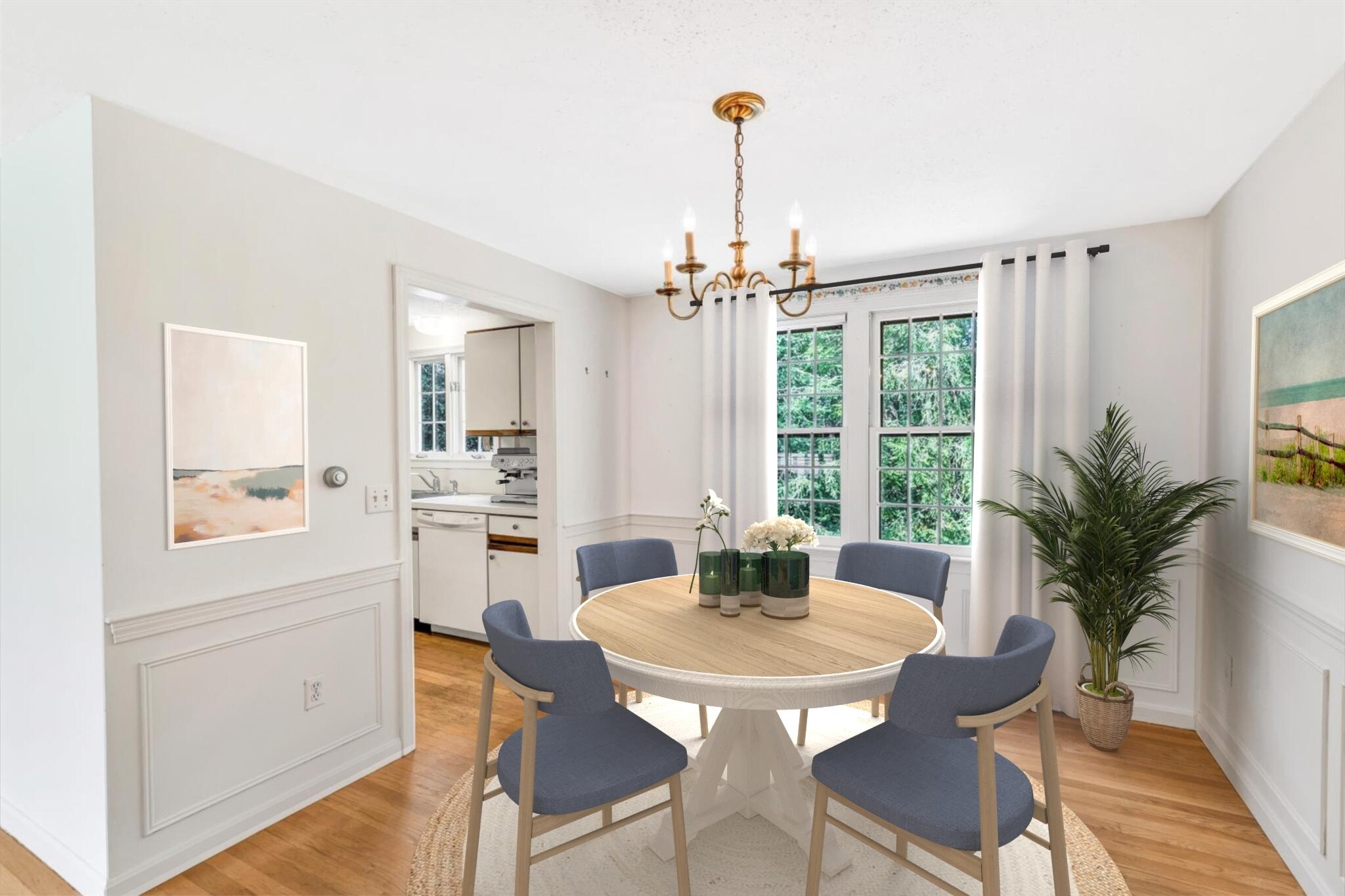 97 Headwaters Road Centerville, MA 02632 - Photo 17 of 44 a view of a dining room with furniture window and wooden floor