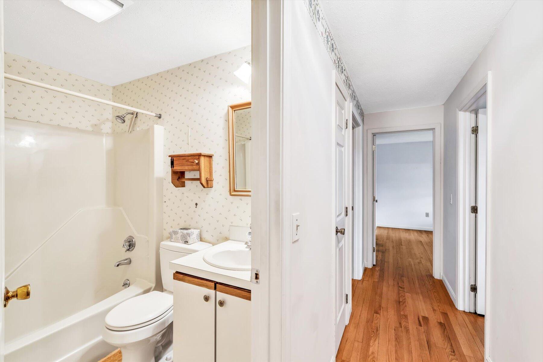 97 Headwaters Road Centerville, MA 02632 - Photo 18 of 44 a bathroom with a sink toilet and shower