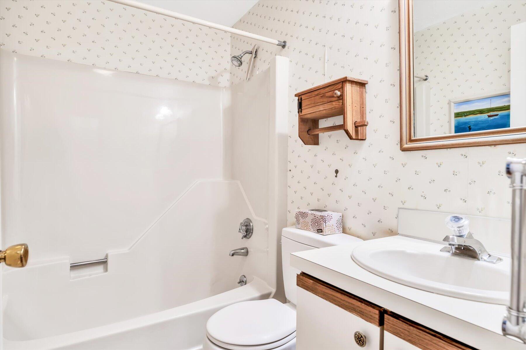 97 Headwaters Road Centerville, MA 02632 - Photo 19 of 44 a bathroom with a sink toilet and shower