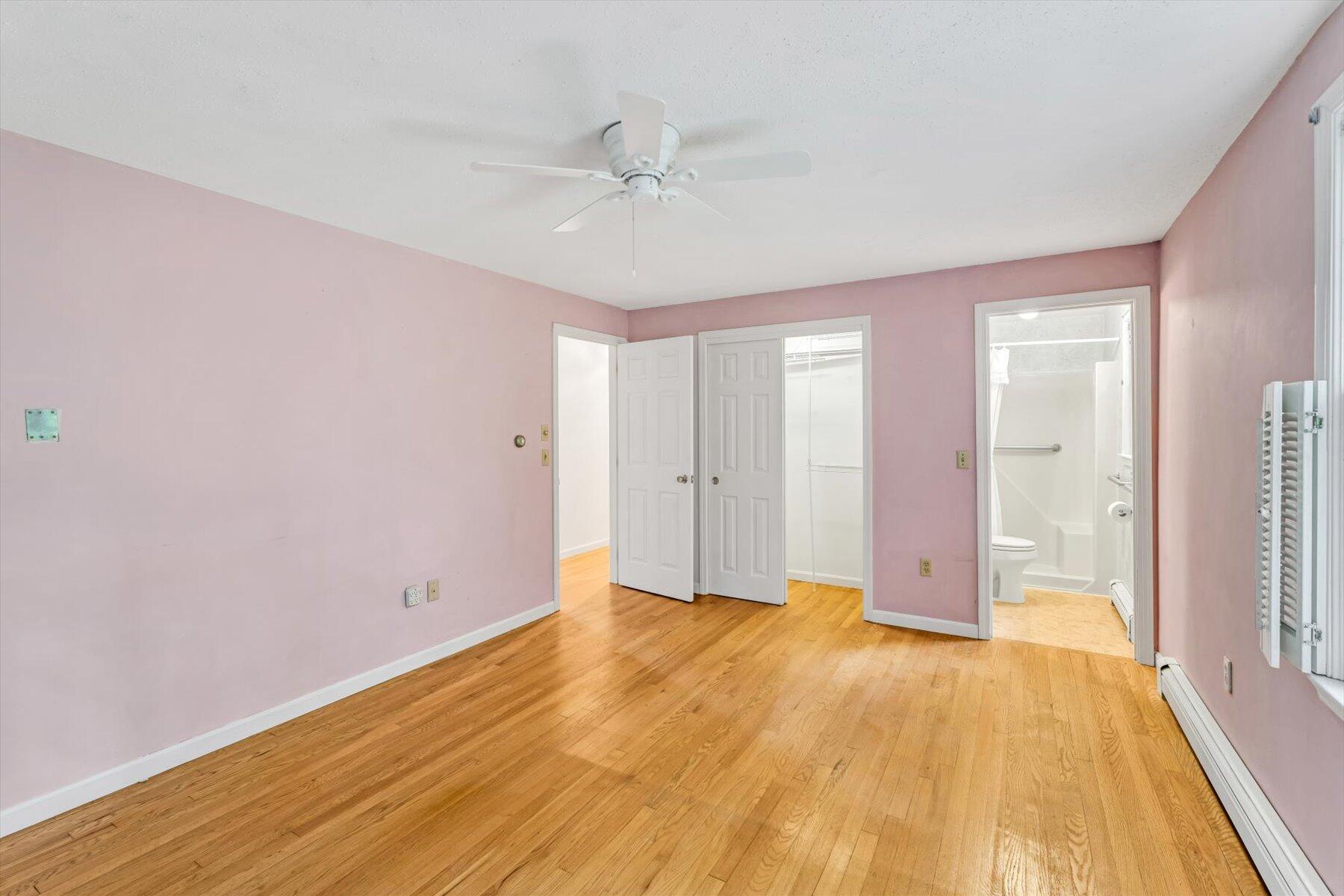 97 Headwaters Road Centerville, MA 02632 - Photo 22 of 44 a view of an empty room with wooden floor
