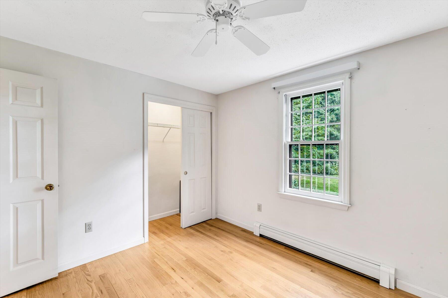 97 Headwaters Road Centerville, MA 02632 - Photo 27 of 44 a view of an empty room with a window