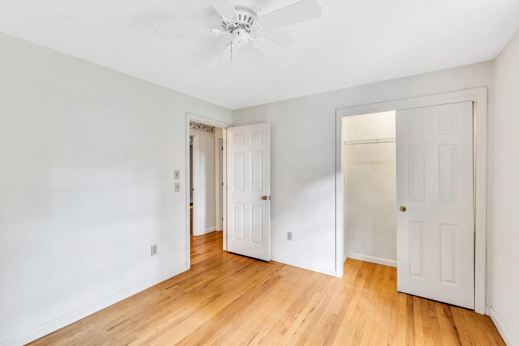 97 Headwaters Road Centerville, MA 02632 - Photo 29 of 44 a view of an empty room and wooden floor