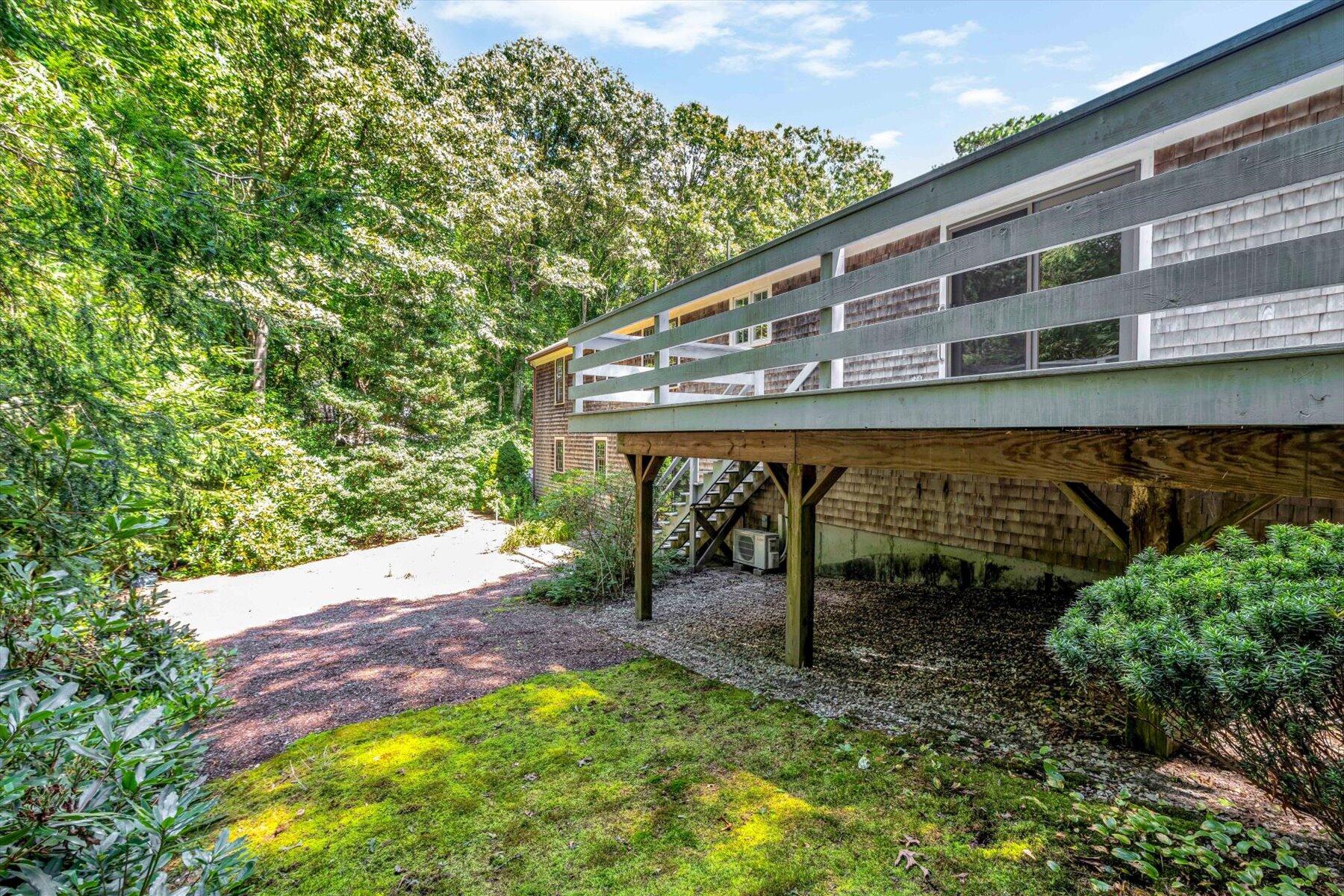 97 Headwaters Road Centerville, MA 02632 - Photo 36 of 44 a balcony with table and chairs