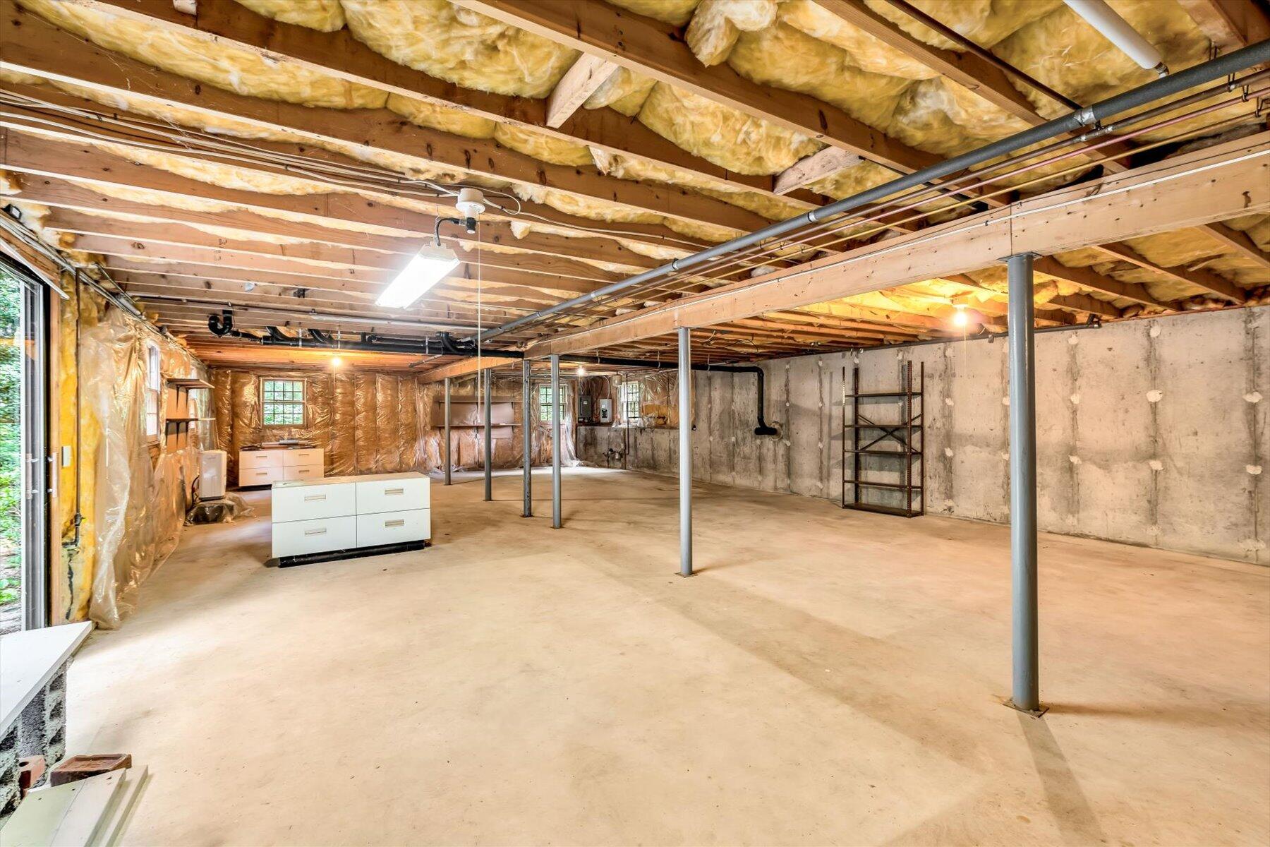 97 Headwaters Road Centerville, MA 02632 - Photo 41 of 44 a view of a big room with glass door and windows