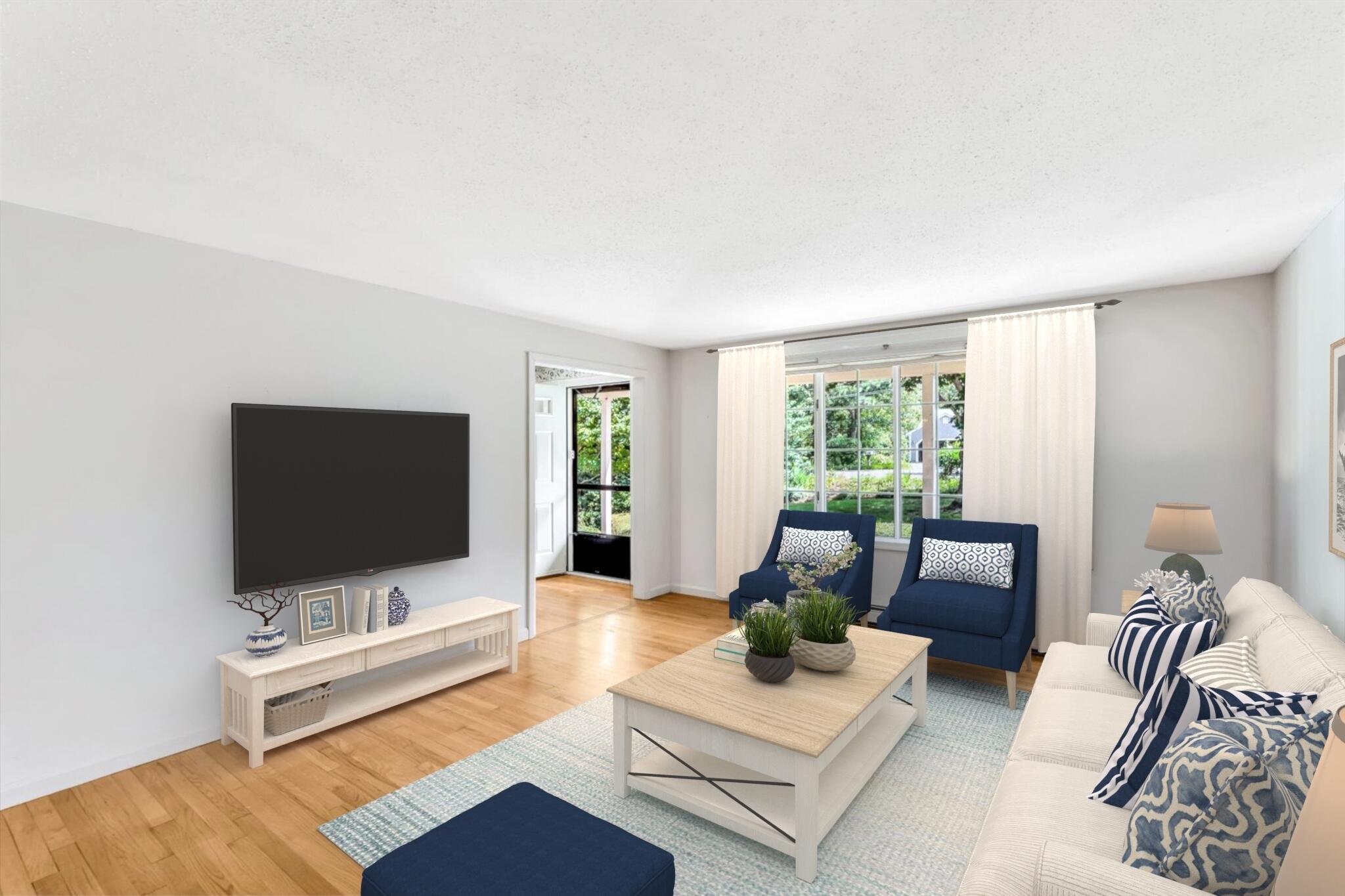 97 Headwaters Road Centerville, MA 02632 - Photo 6 of 44 a living room with furniture and a flat screen tv