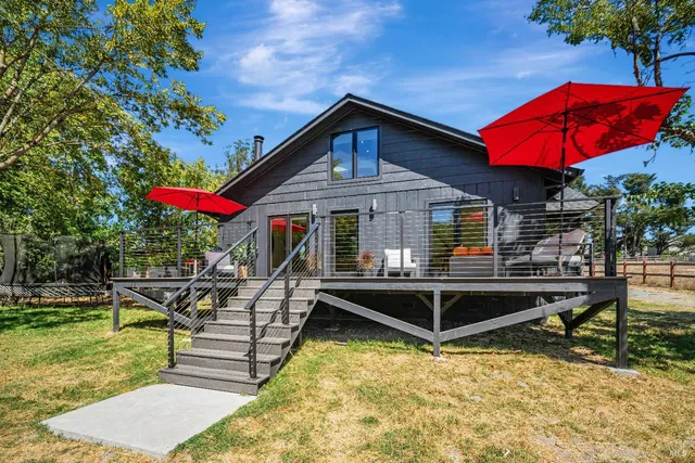 swimming pool view with a seating space