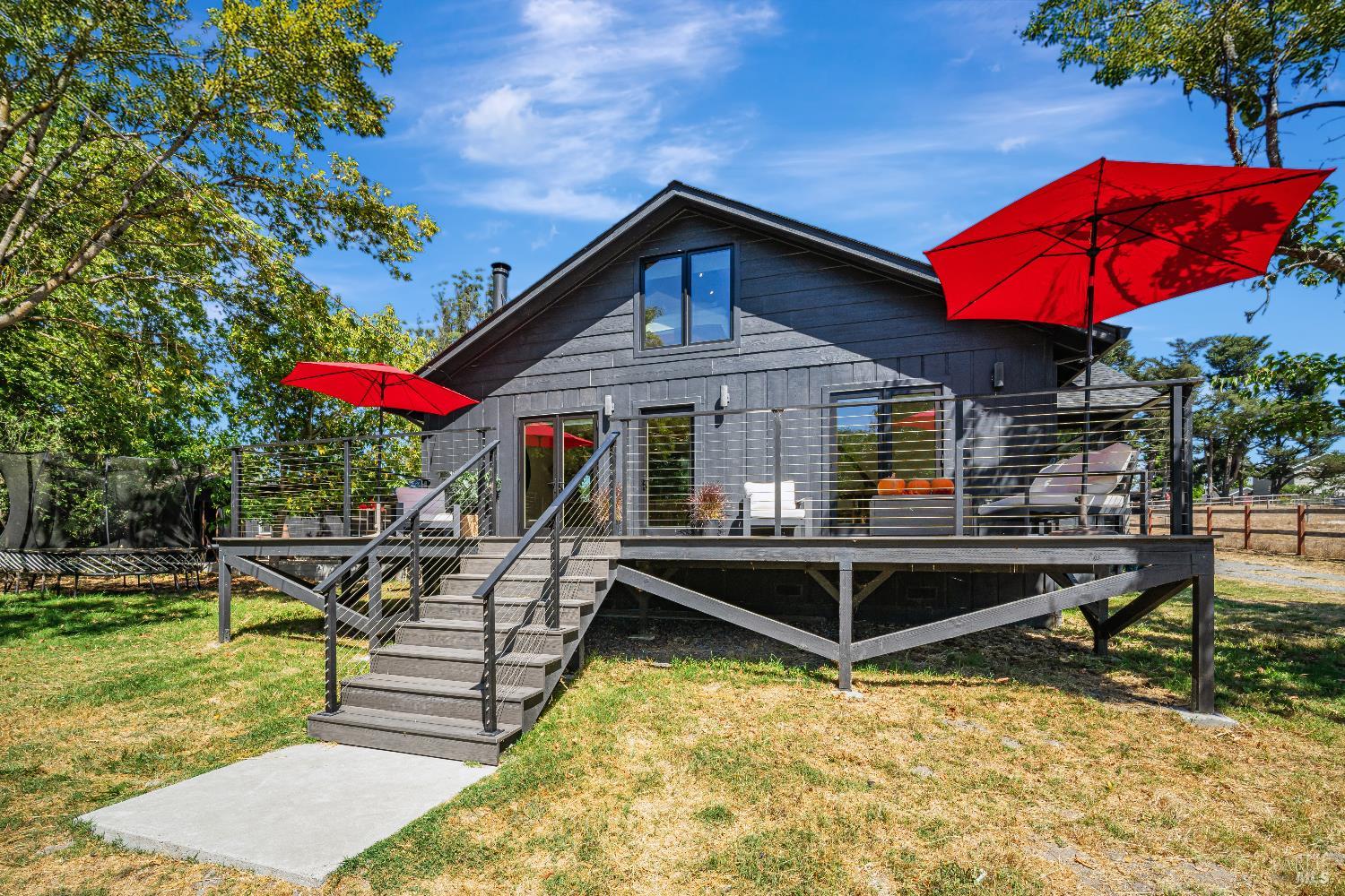 swimming pool view with a seating space