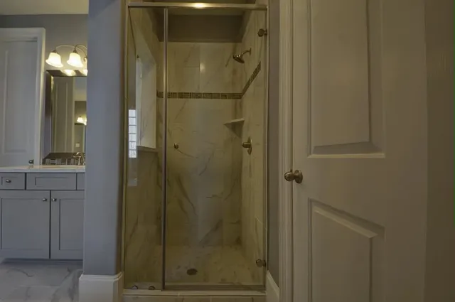 a bathroom with a mirror