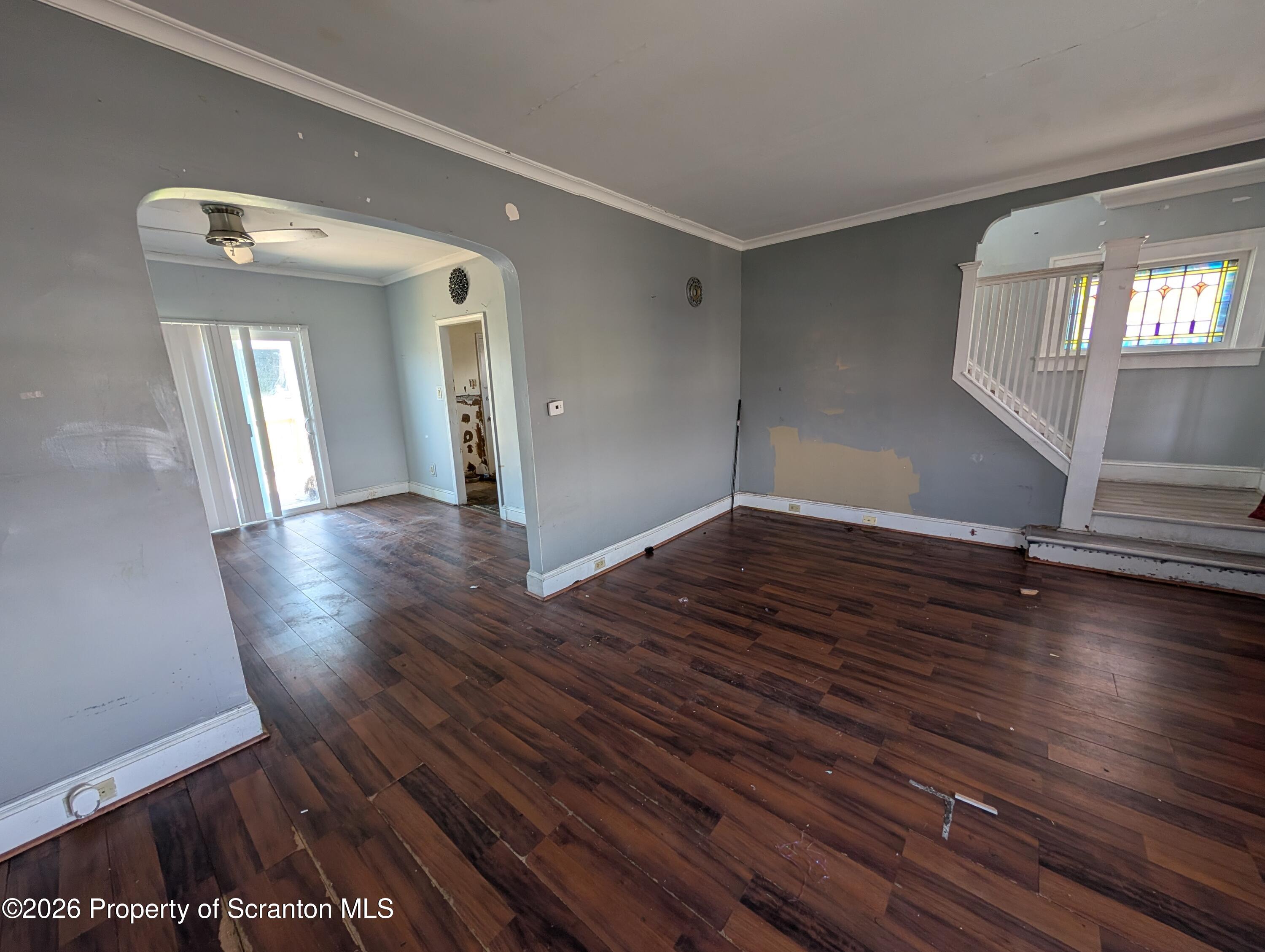 2307 Prospect Avenue Scranton, PA 18505 - Photo 4 of 11 wooden floor in an empty room with a window