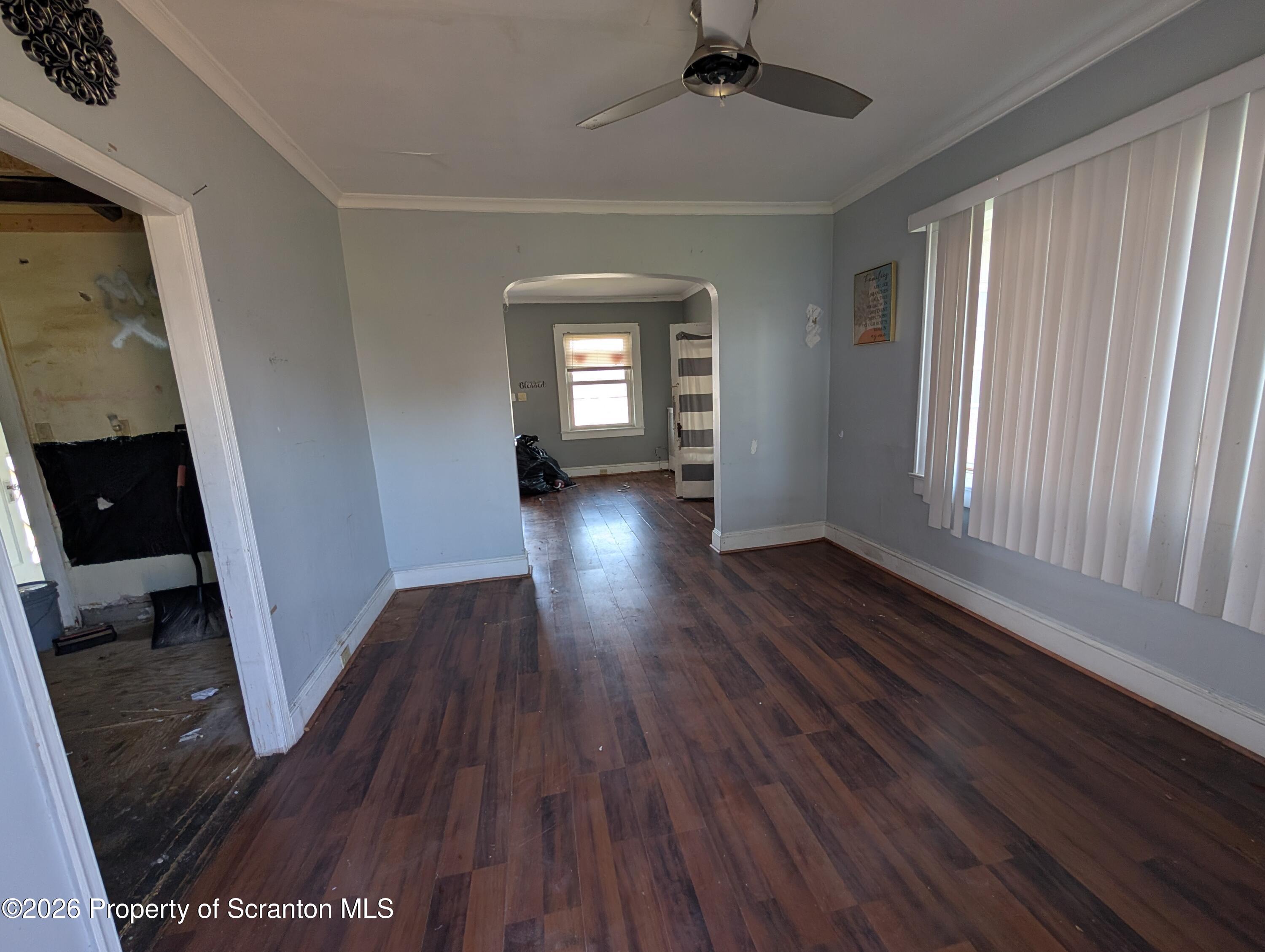 2307 Prospect Avenue Scranton, PA 18505 - Photo 5 of 11 wooden floor in an empty room with a window