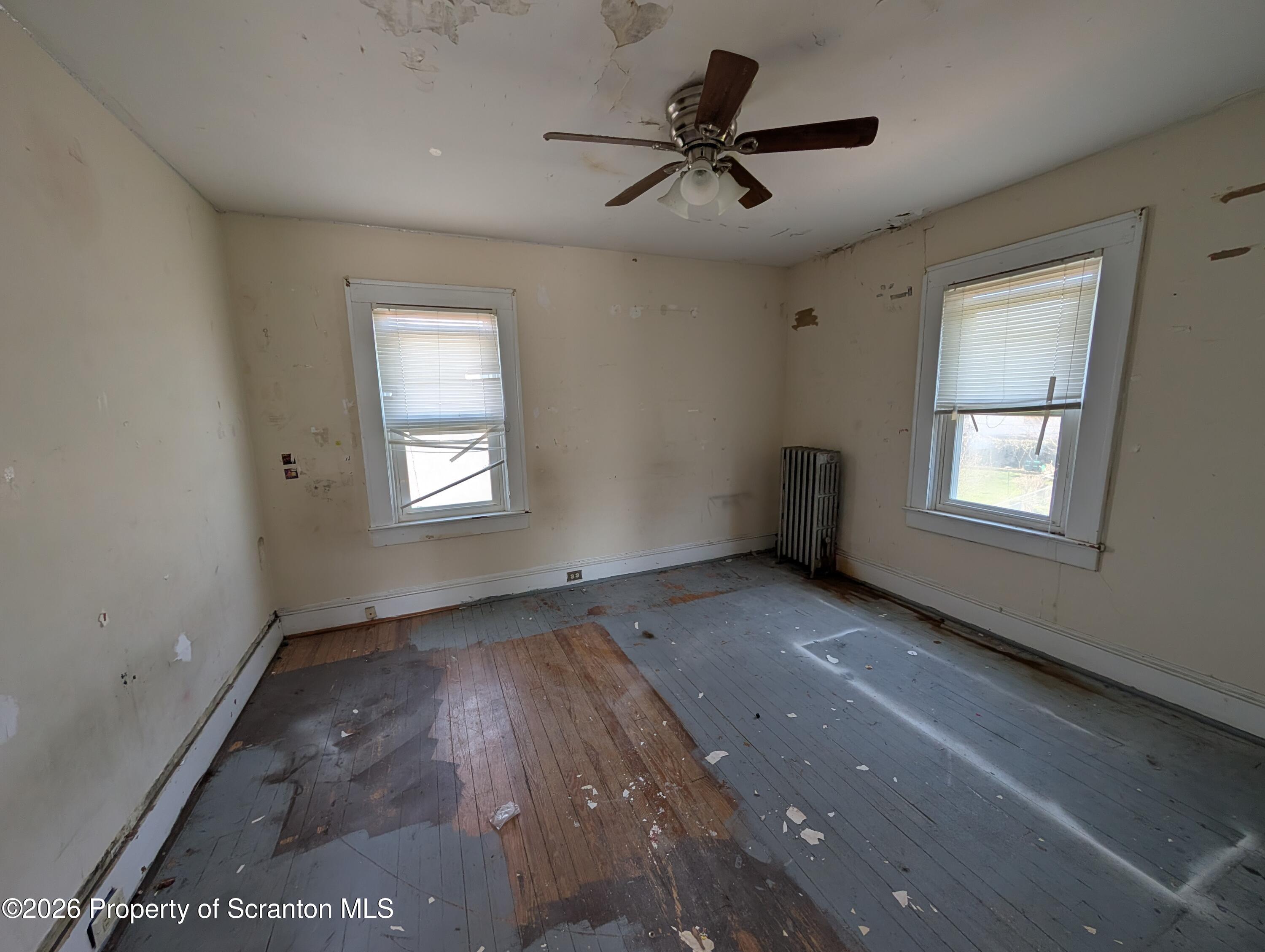 2307 Prospect Avenue Scranton, PA 18505 - Photo 8 of 11 a view of empty room with windows