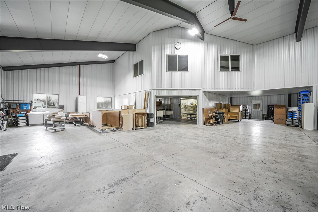 9561 Creaser Road North Bloomfield, OH 44450 - Photo 38 of 45 Misc room featuring vaulted ceiling and a garage