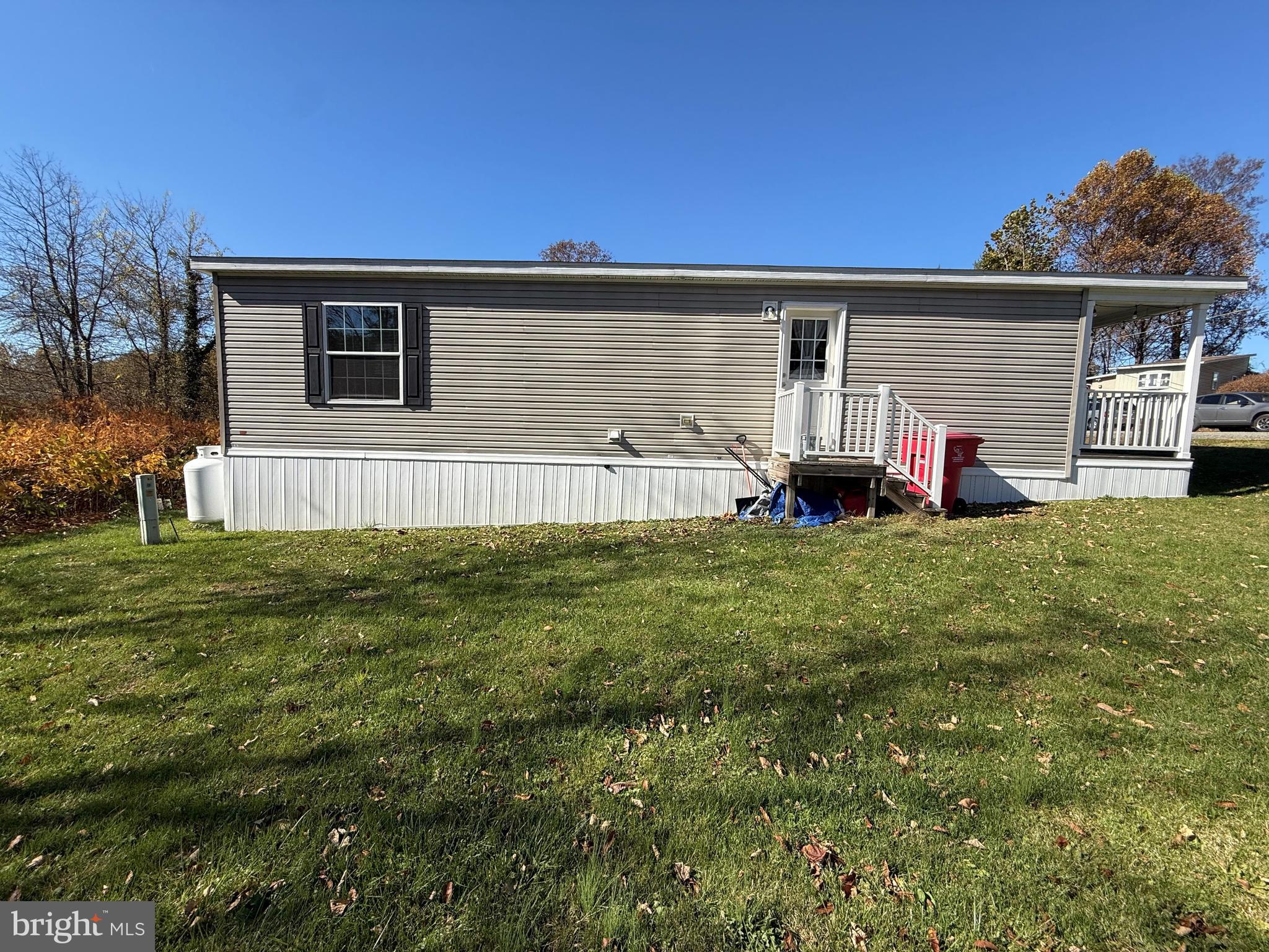 22 Apache Run Barto, PA 19504 - Photo 17 of 22 a front view of a house with a yard and trees