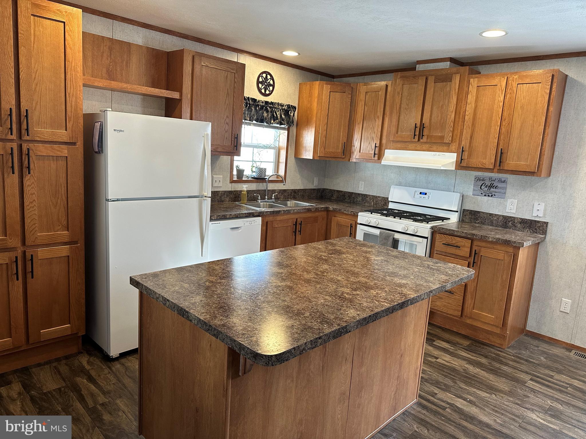 22 Apache Run Barto, PA 19504 - Photo 3 of 22 a kitchen with a sink a refrigerator a stove a washer dryer and cabinets