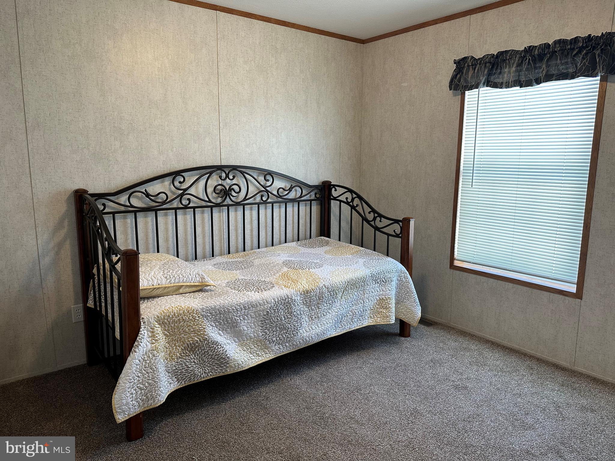22 Apache Run Barto, PA 19504 - Photo 9 of 22 a bed sitting in a bedroom next to a window