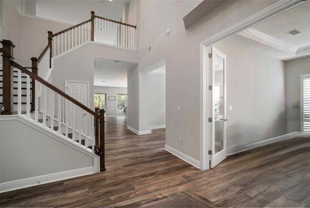 7004 Mainland Avenue Apollo Beach, FL 33572 - Photo 11 of 67 a view of entryway with wooden floor