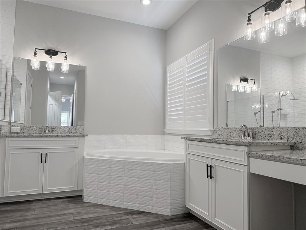 7004 Mainland Avenue Apollo Beach, FL 33572 - Photo 34 of 67 a bathroom with a sink and a mirror