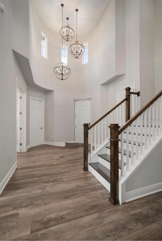 7004 Mainland Avenue Apollo Beach, FL 33572 - Photo 10 of 67 a view of entryway and hall with wooden floor
