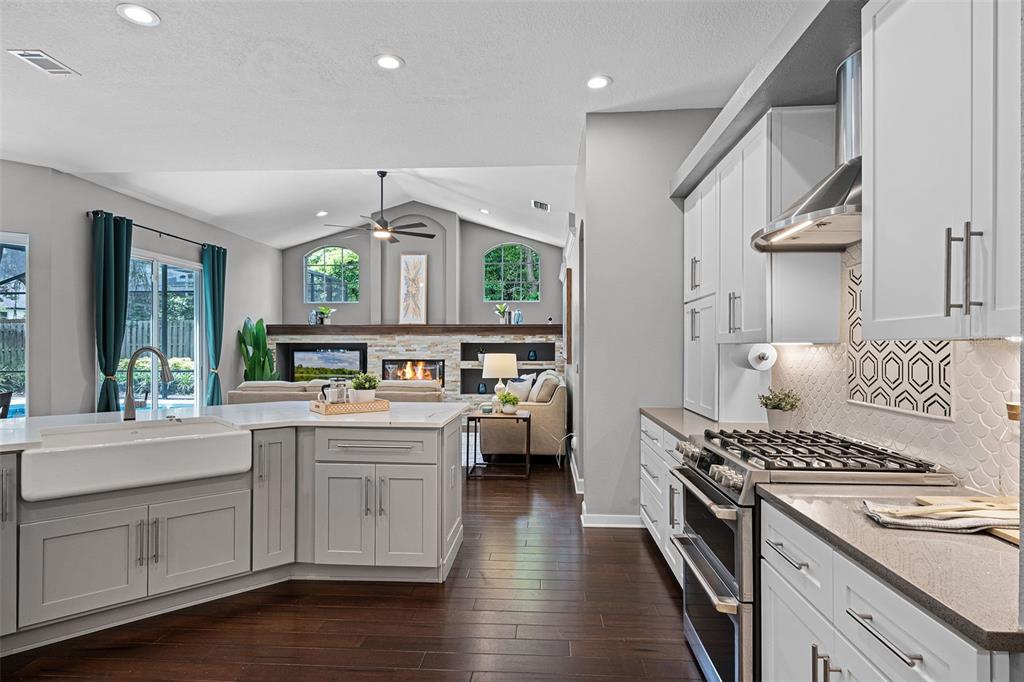 315 Lake Road Lake Mary, FL 32746 - Photo 23 of 65 KITCHEN INTO FAMILY ROOM