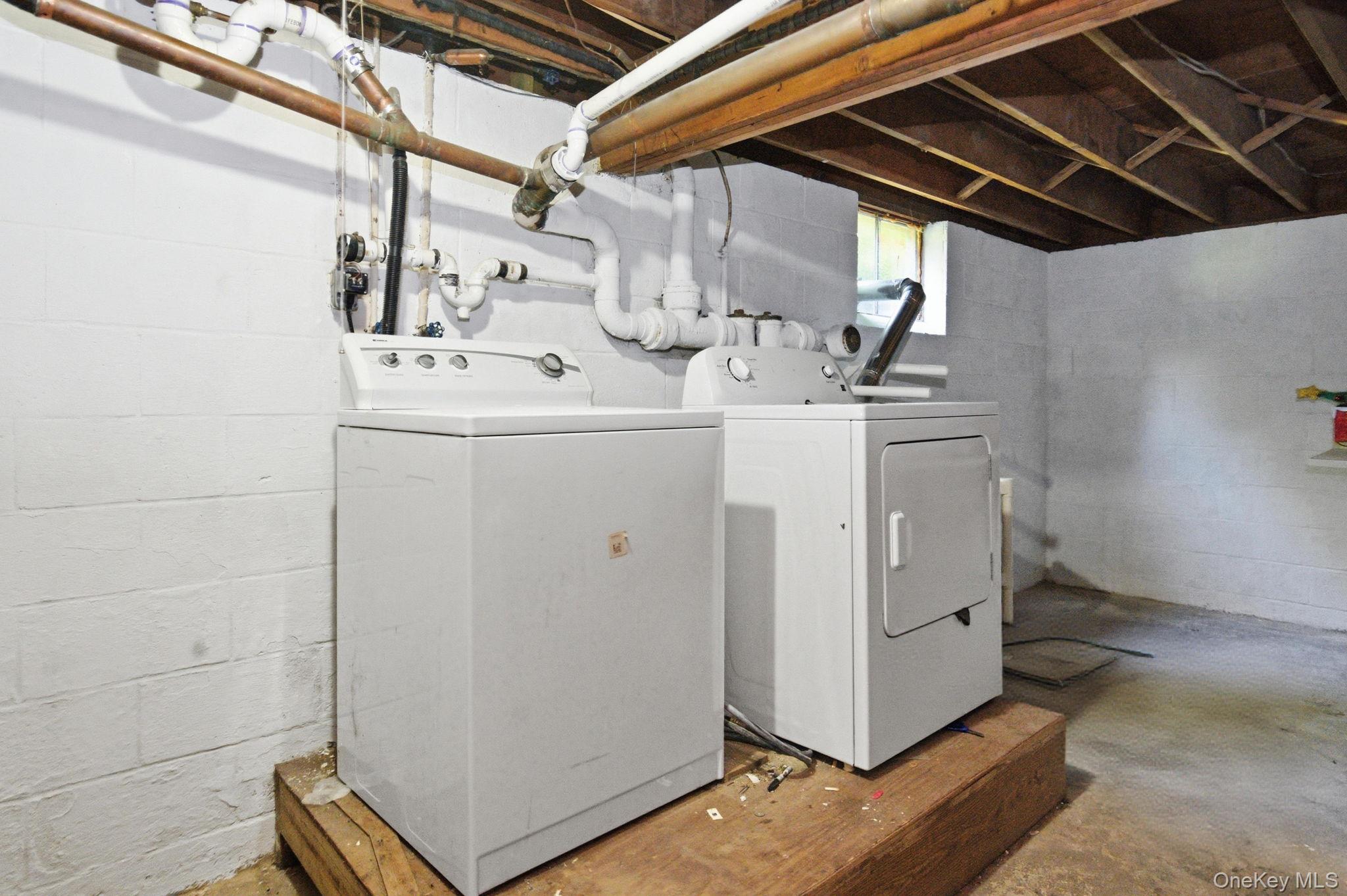 35 Deans Bridge Road Somers, NY 10589 - Photo 23 of 49 Generous unfinished storage with surprising ceiling height adds laundry, workshop, and storage potential with room to make it your own.