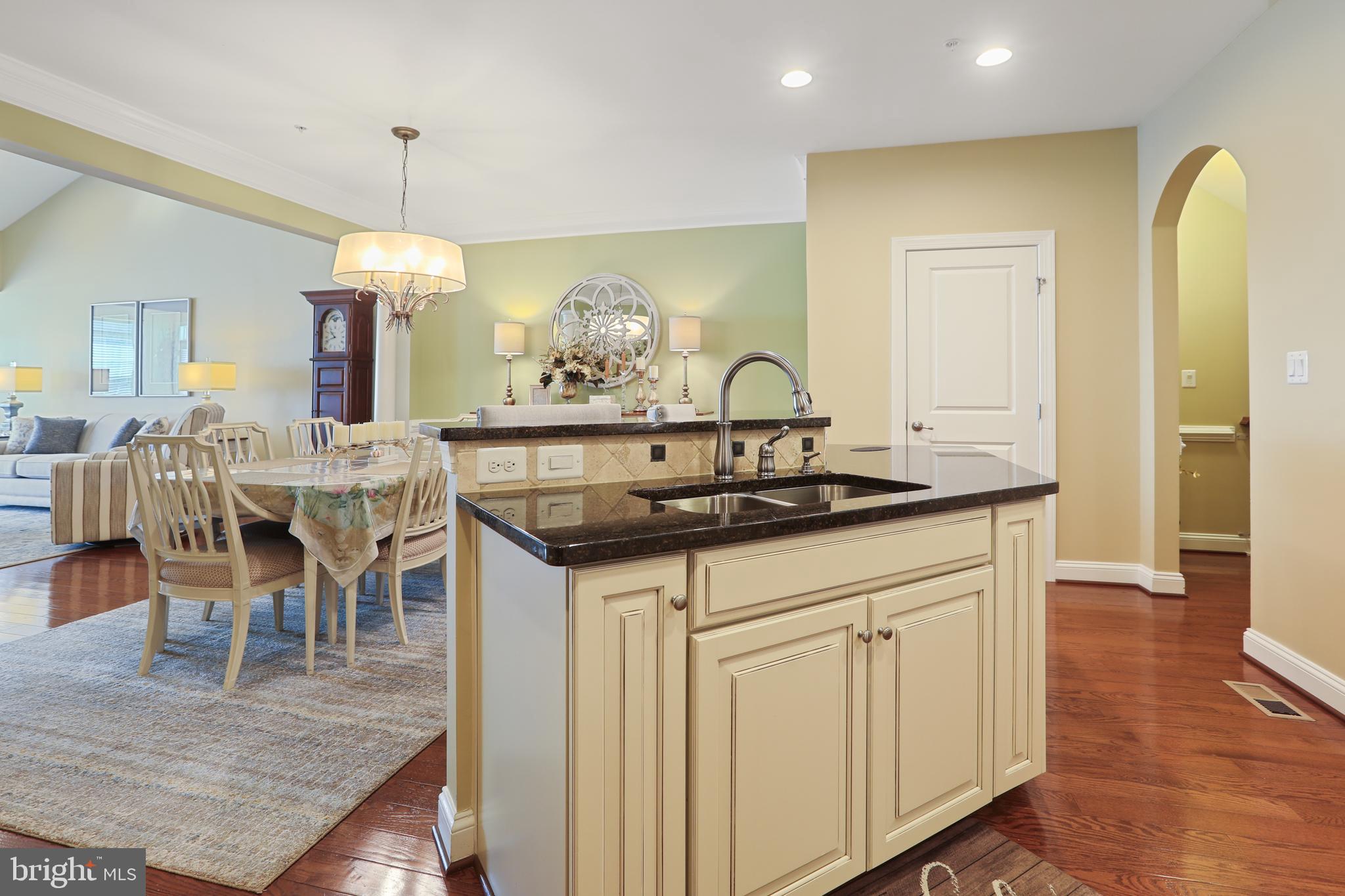 1843 Exton Drive, Unit 197 Fallston, MD 21047 - Photo 14 of 68 a view of dining table chairs and chandelier